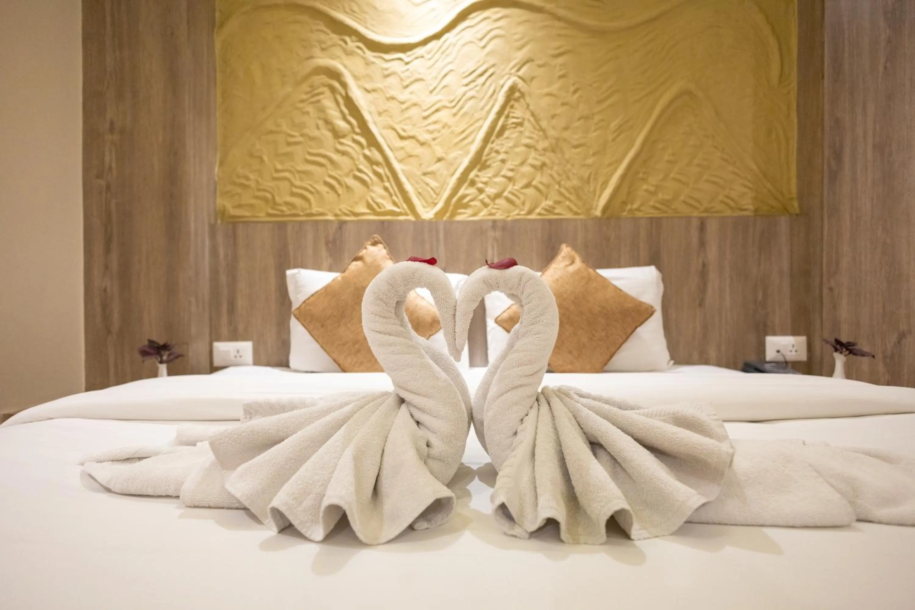 Bed in Divya Boutique Inn