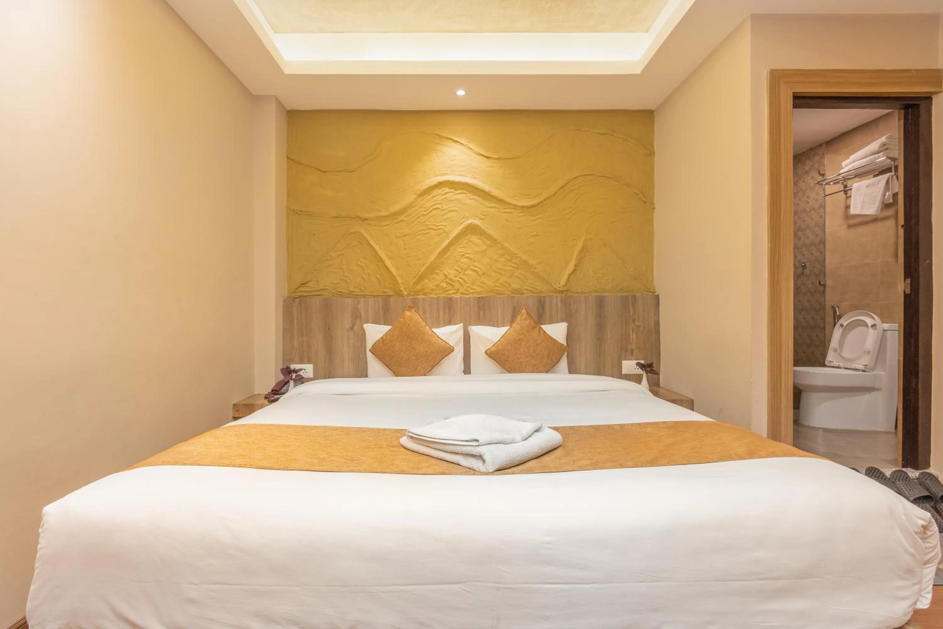 Bed in Divya Boutique Inn