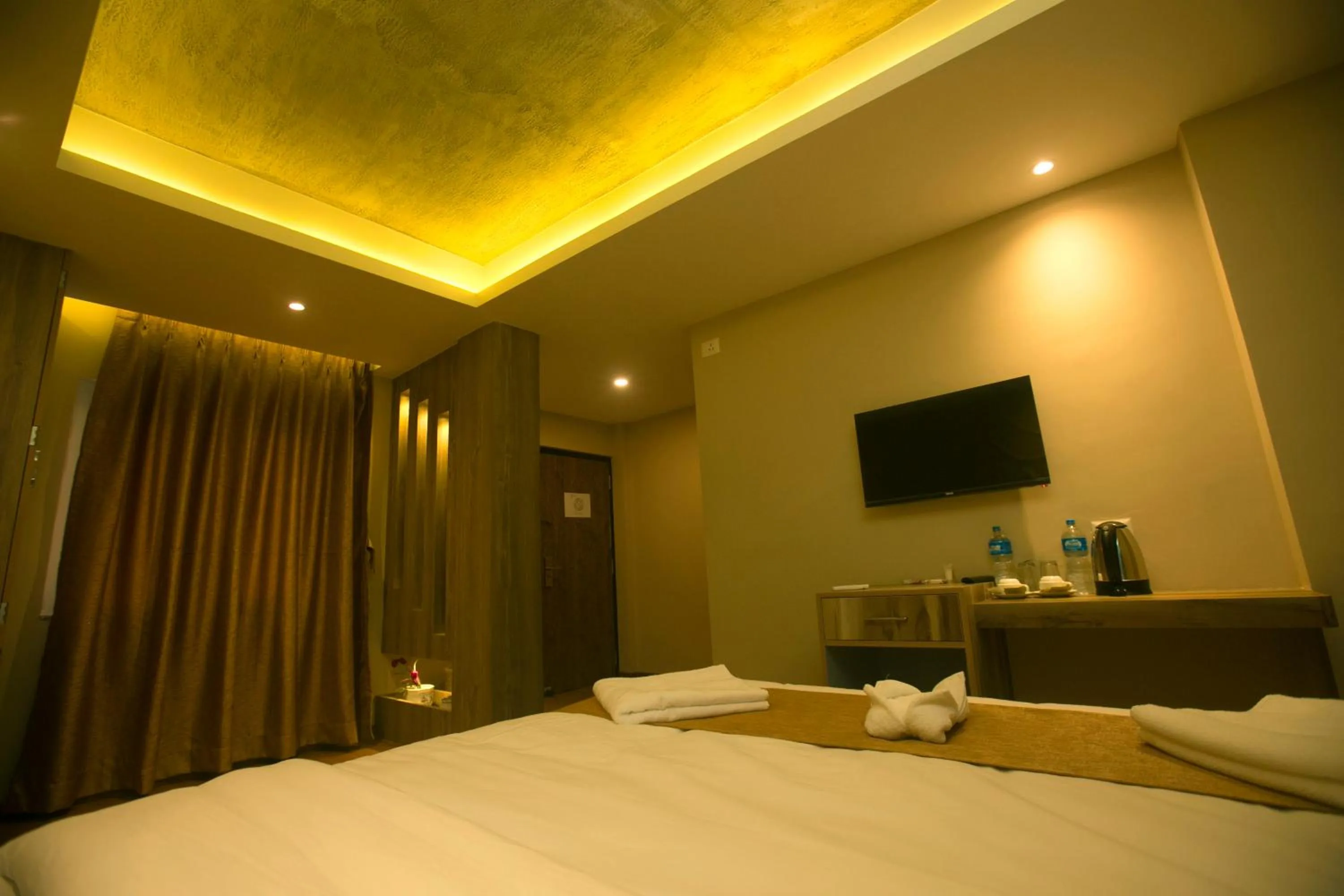 Bed in Divya Boutique Inn