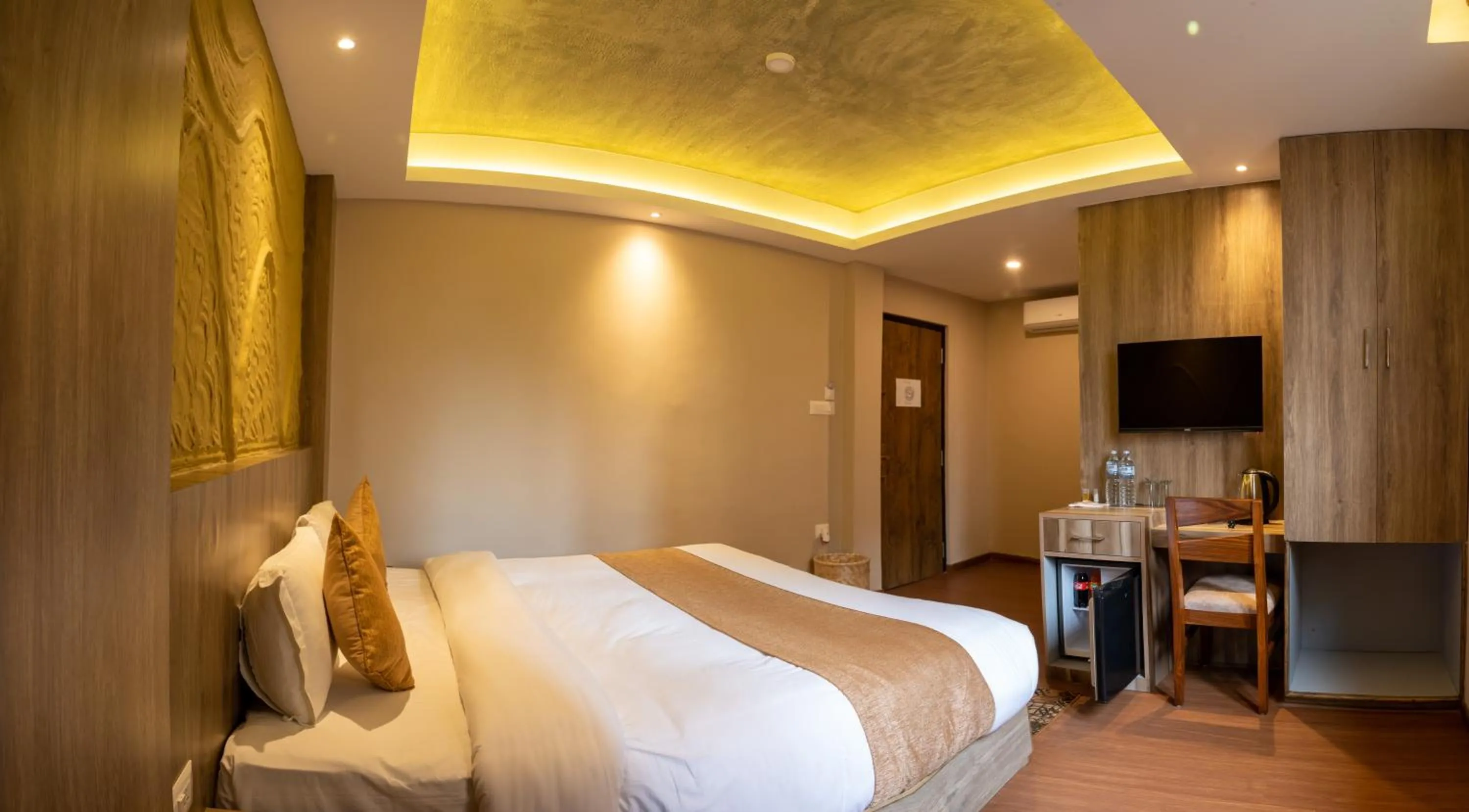 Bed in Divya Boutique Inn