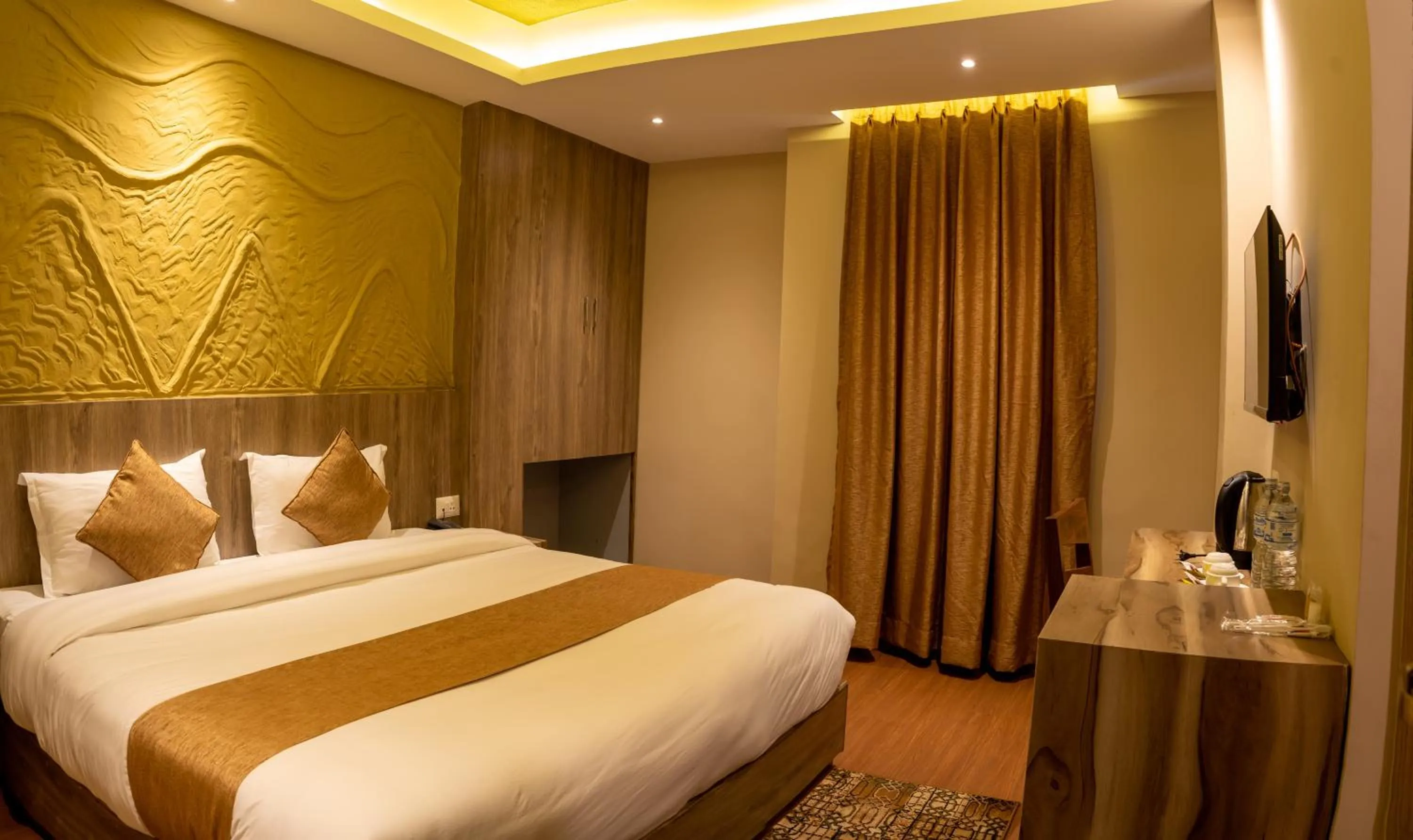 Bed in Divya Boutique Inn