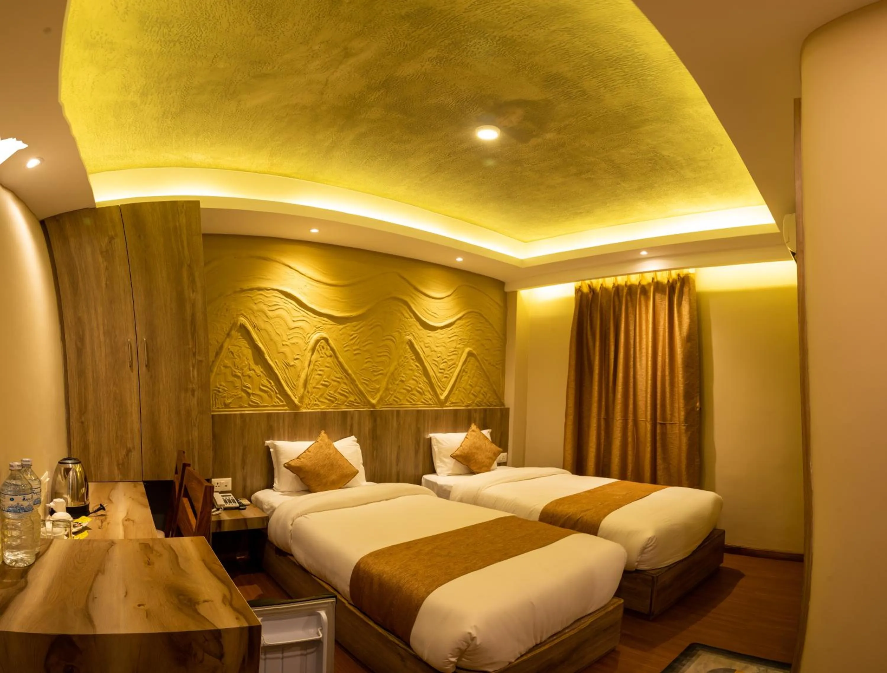 Bed in Divya Boutique Inn