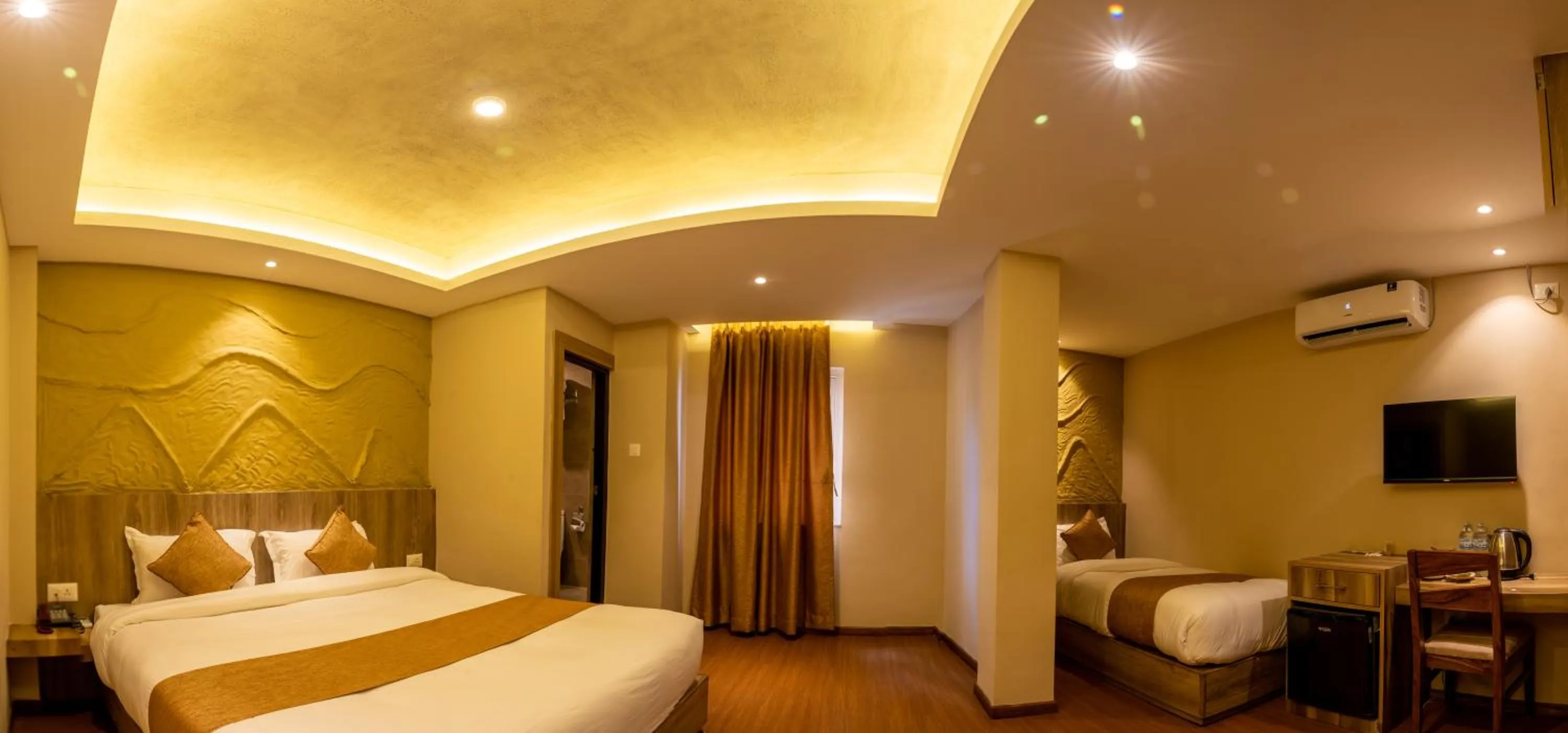 Bed in Divya Boutique Inn