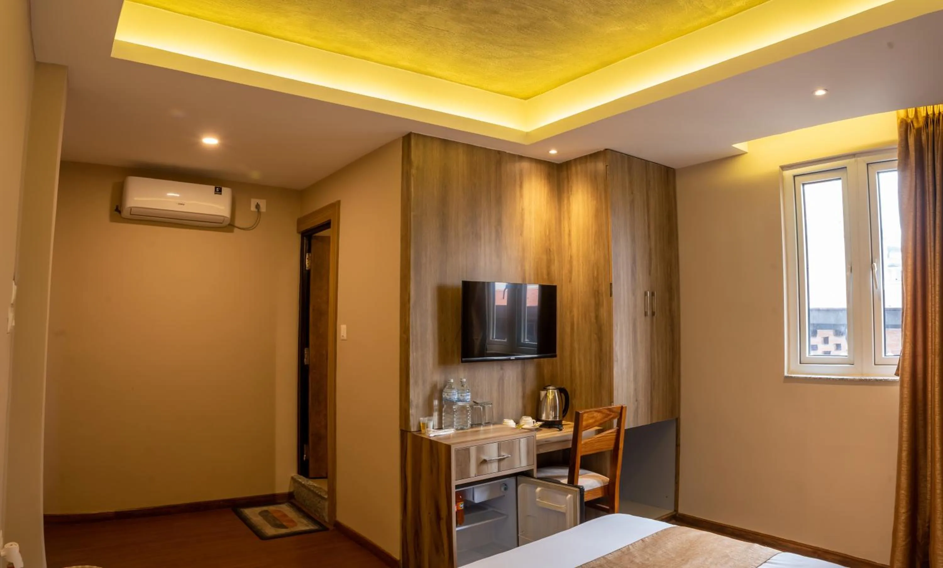 Bed in Divya Boutique Inn