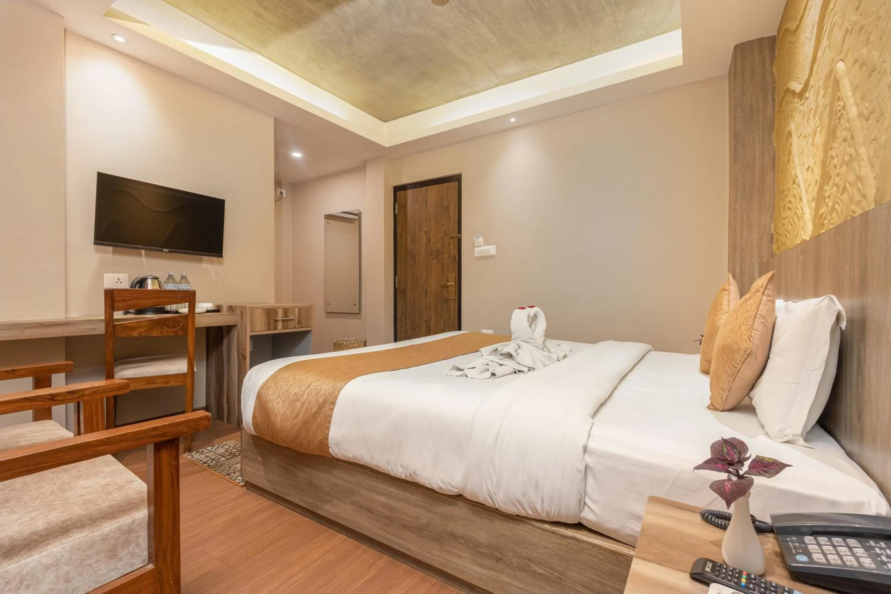 Bed in Divya Boutique Inn