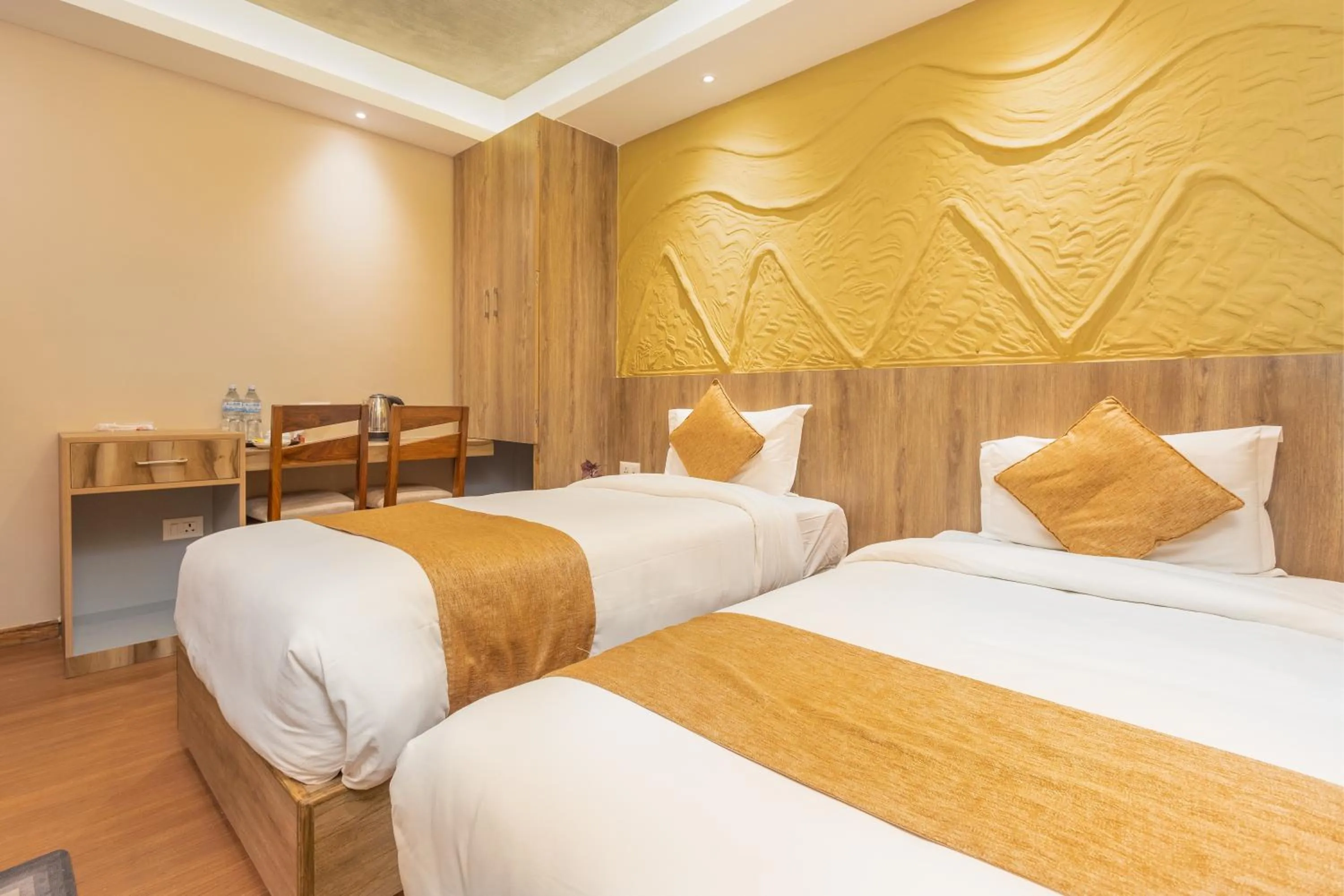 Bed in Divya Boutique Inn