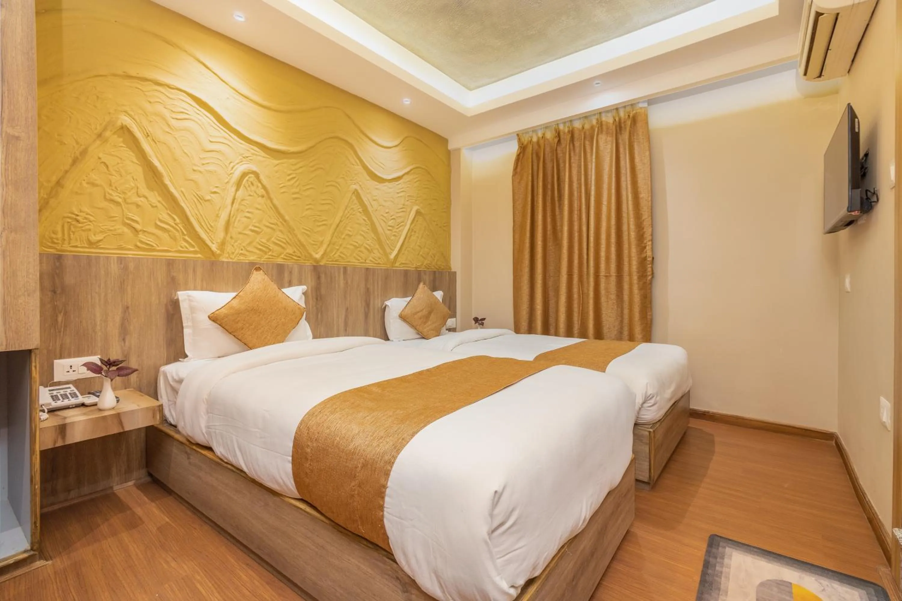 Bed in Divya Boutique Inn