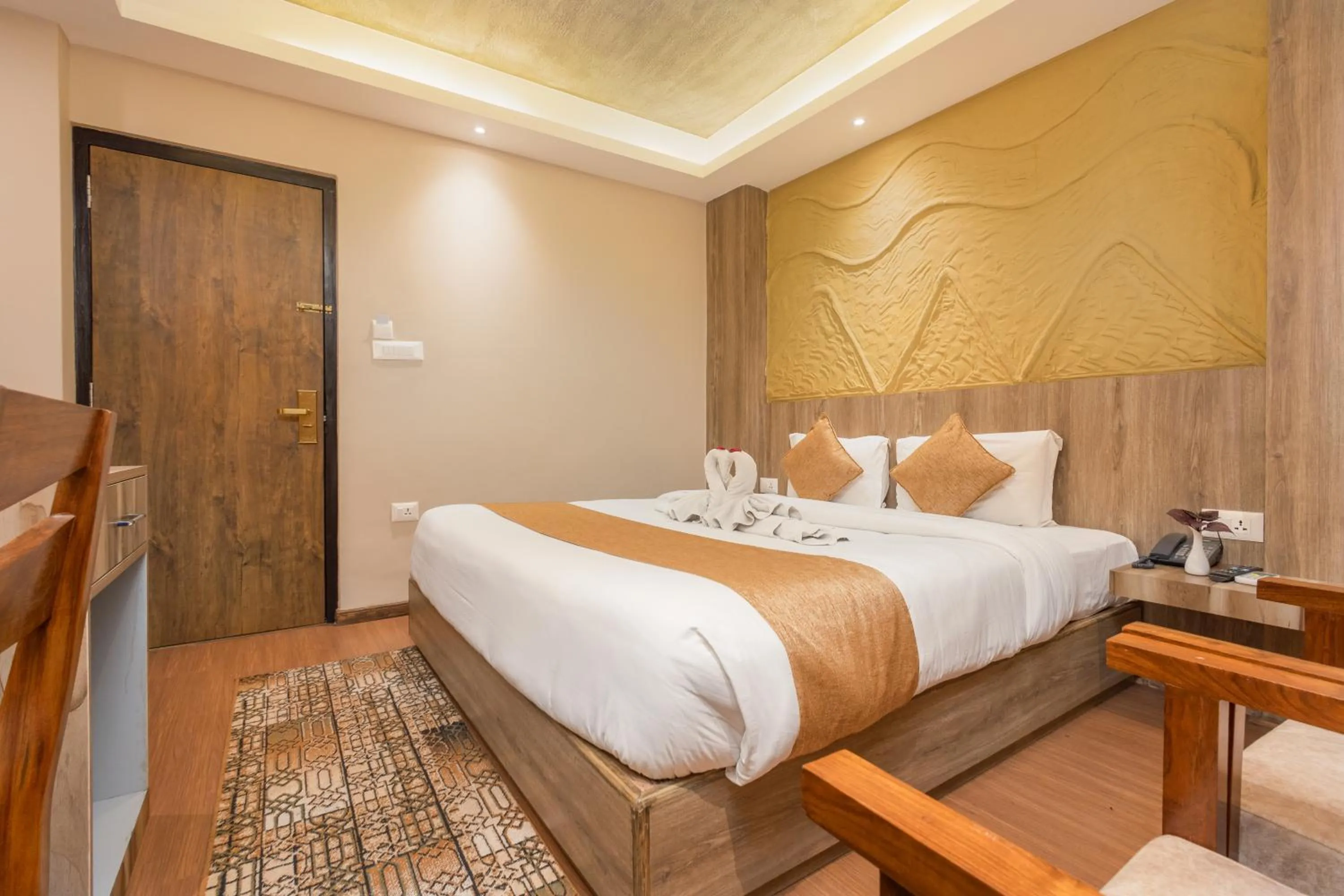 Bed in Divya Boutique Inn