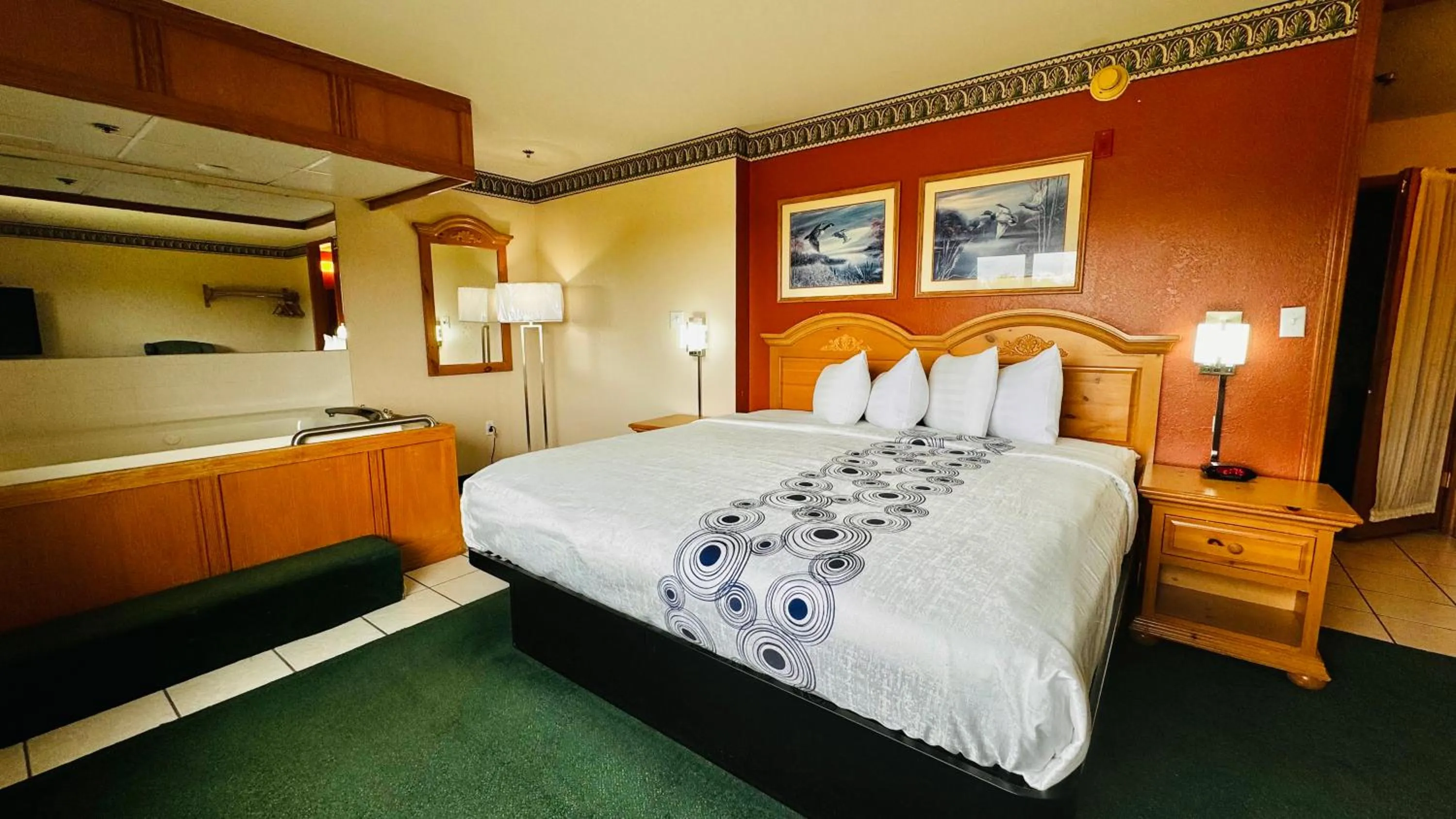 Bed in Regency Inn and Suites