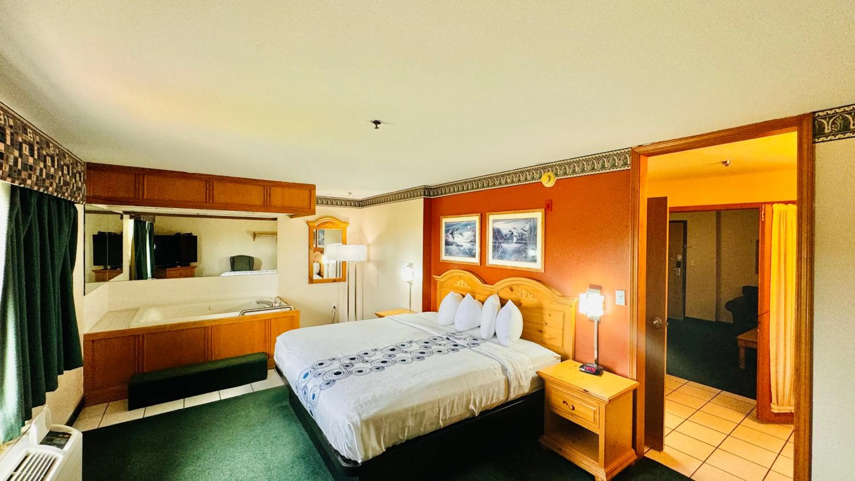 Bed in Regency Inn and Suites