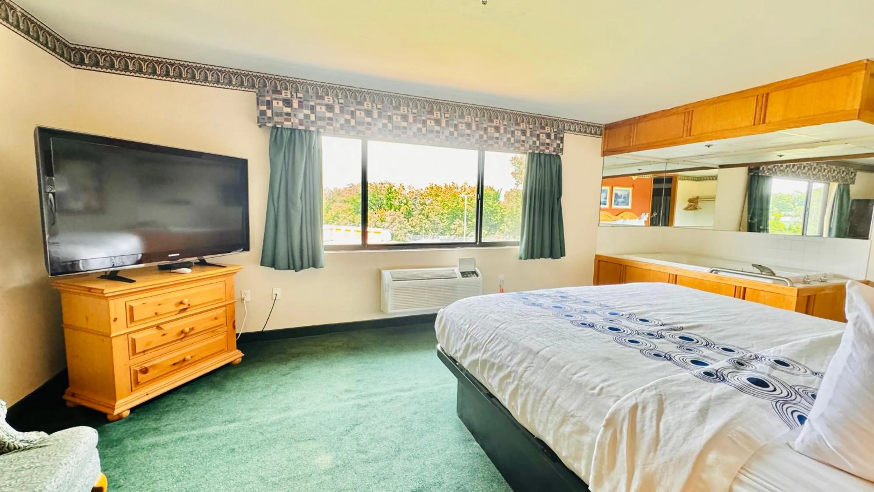 Bed in Regency Inn and Suites