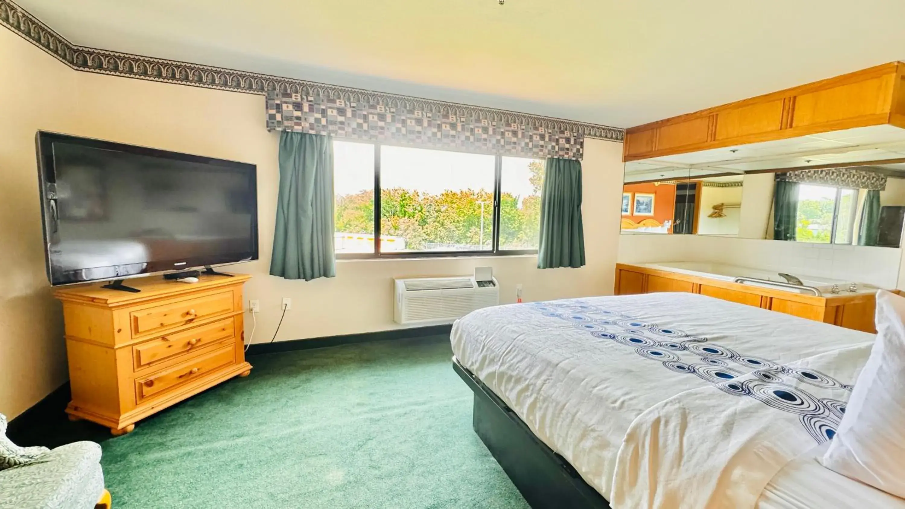 Bed in Regency Inn and Suites Bed in Regency Inn and Suites