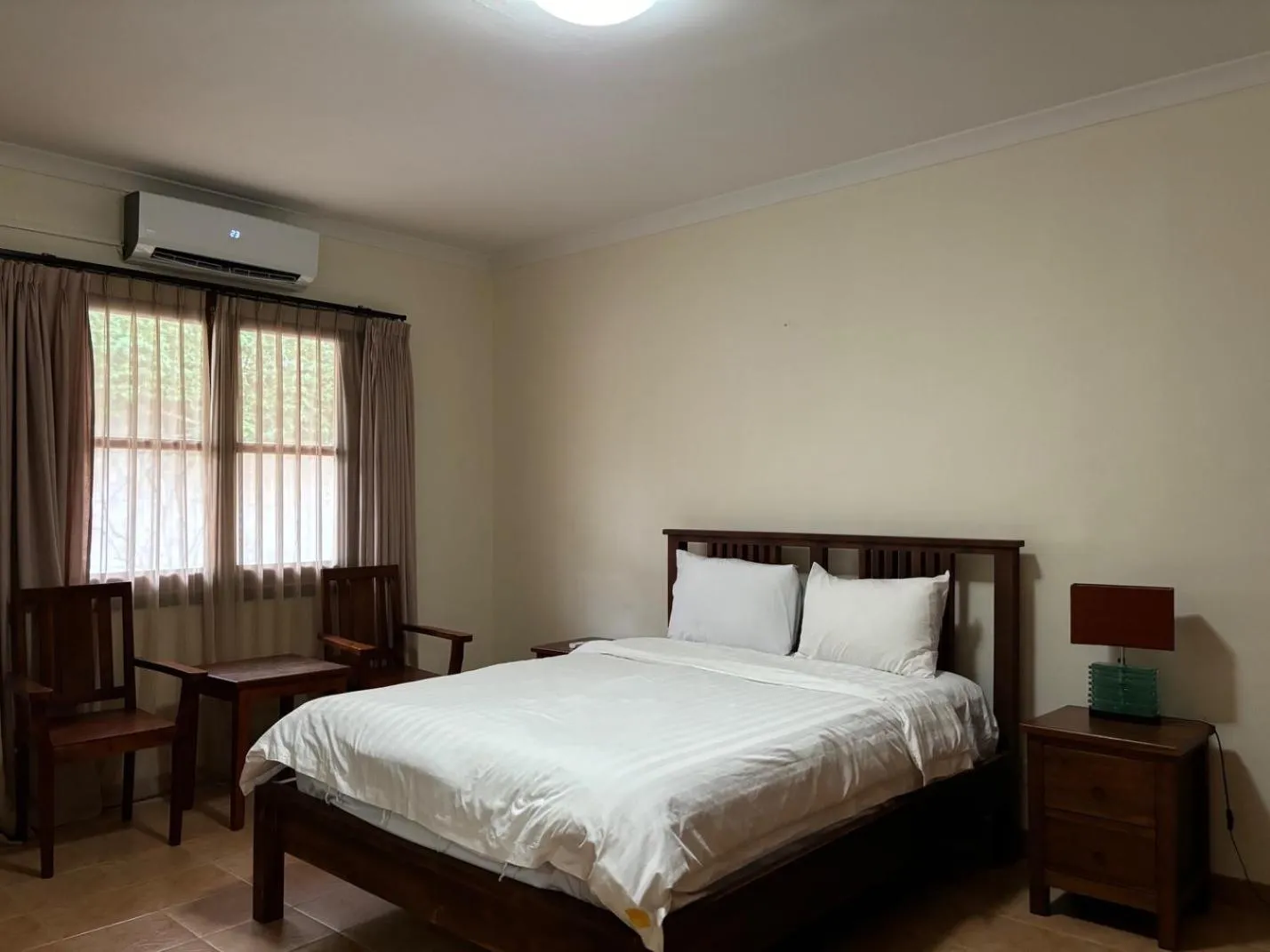 Bed in Palm Malinamoc Hotel