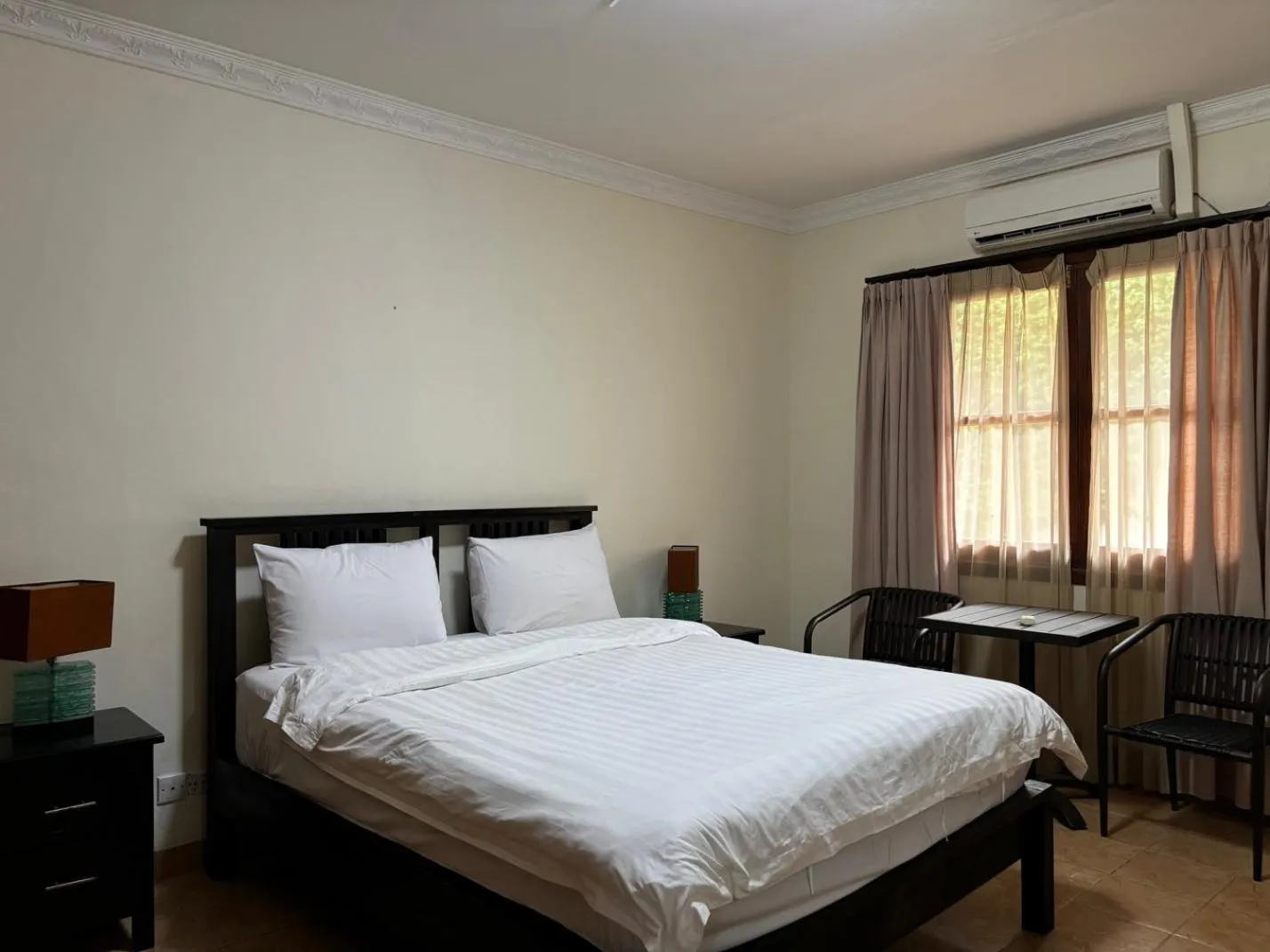 Bed in Palm Malinamoc Hotel