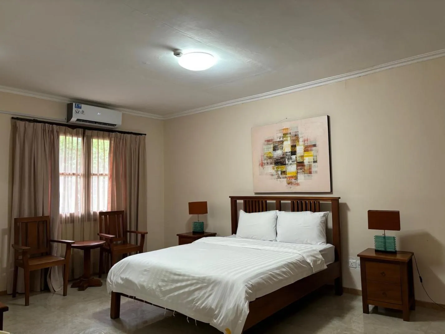 Bed in Palm Malinamoc Hotel