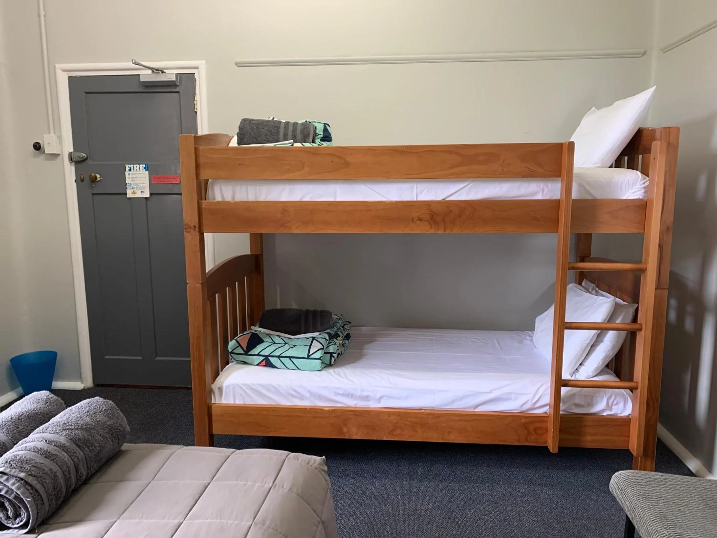 Bed in Thomas's Catlins Lodge and Camp Ground