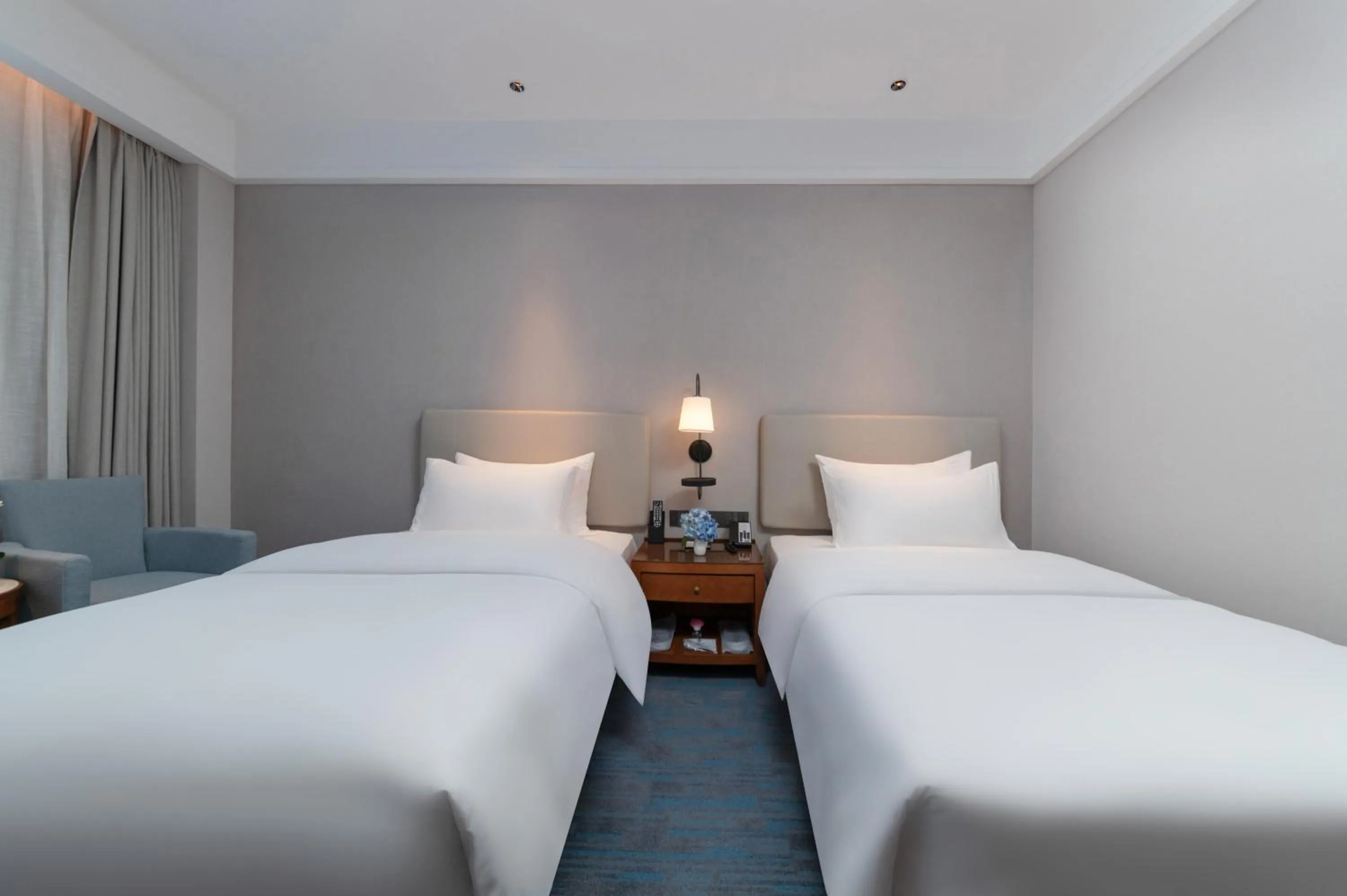 Bedroom, Bed in Xiamen Xiang An Yi Hao Hotel