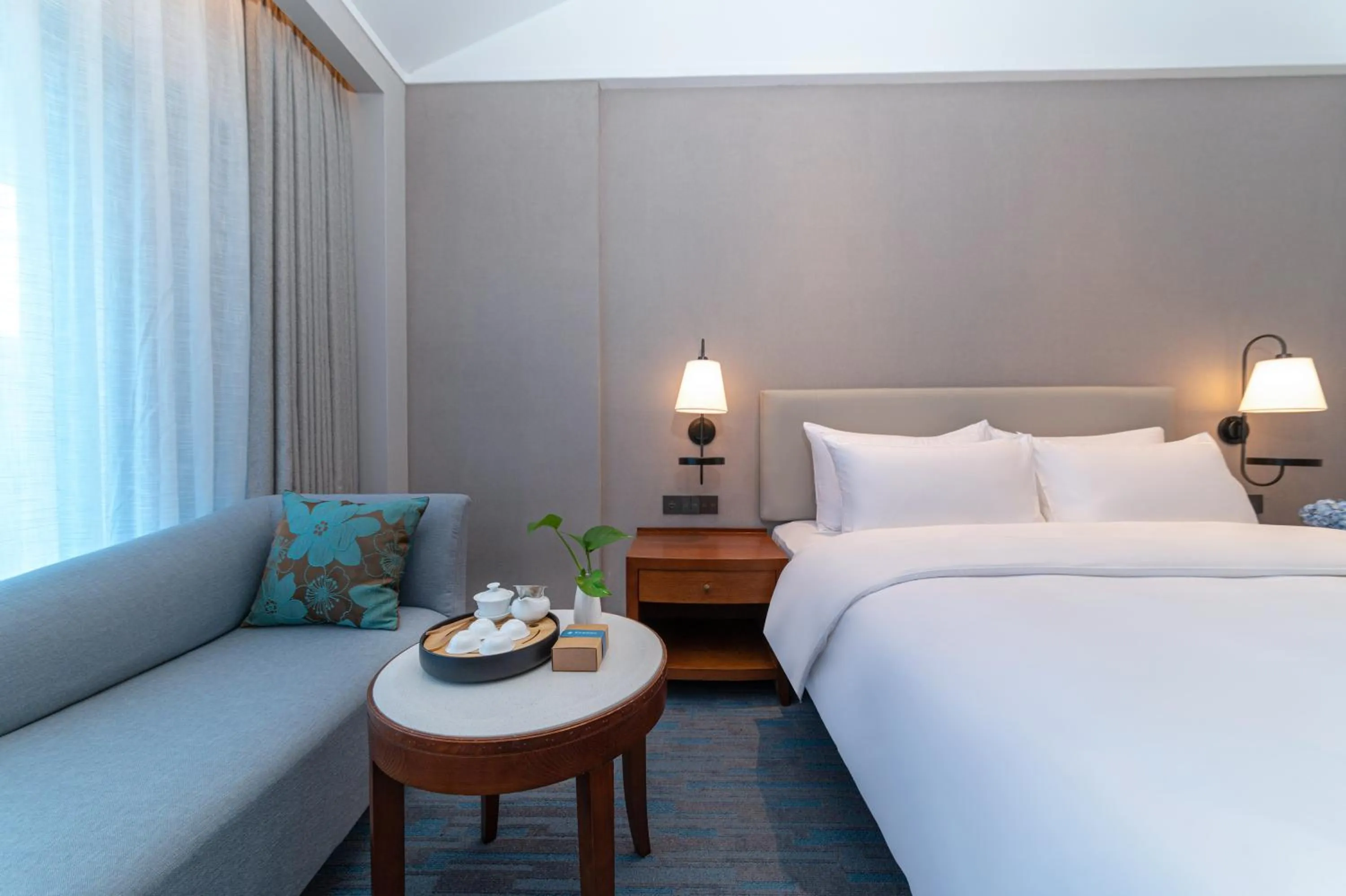 Bedroom, Bed in Xiamen Xiang An Yi Hao Hotel