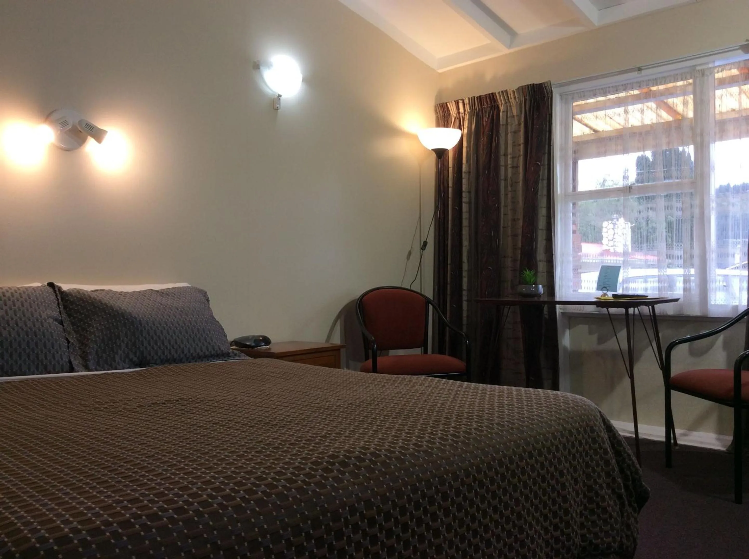 Bed in AAA Marlin Motel