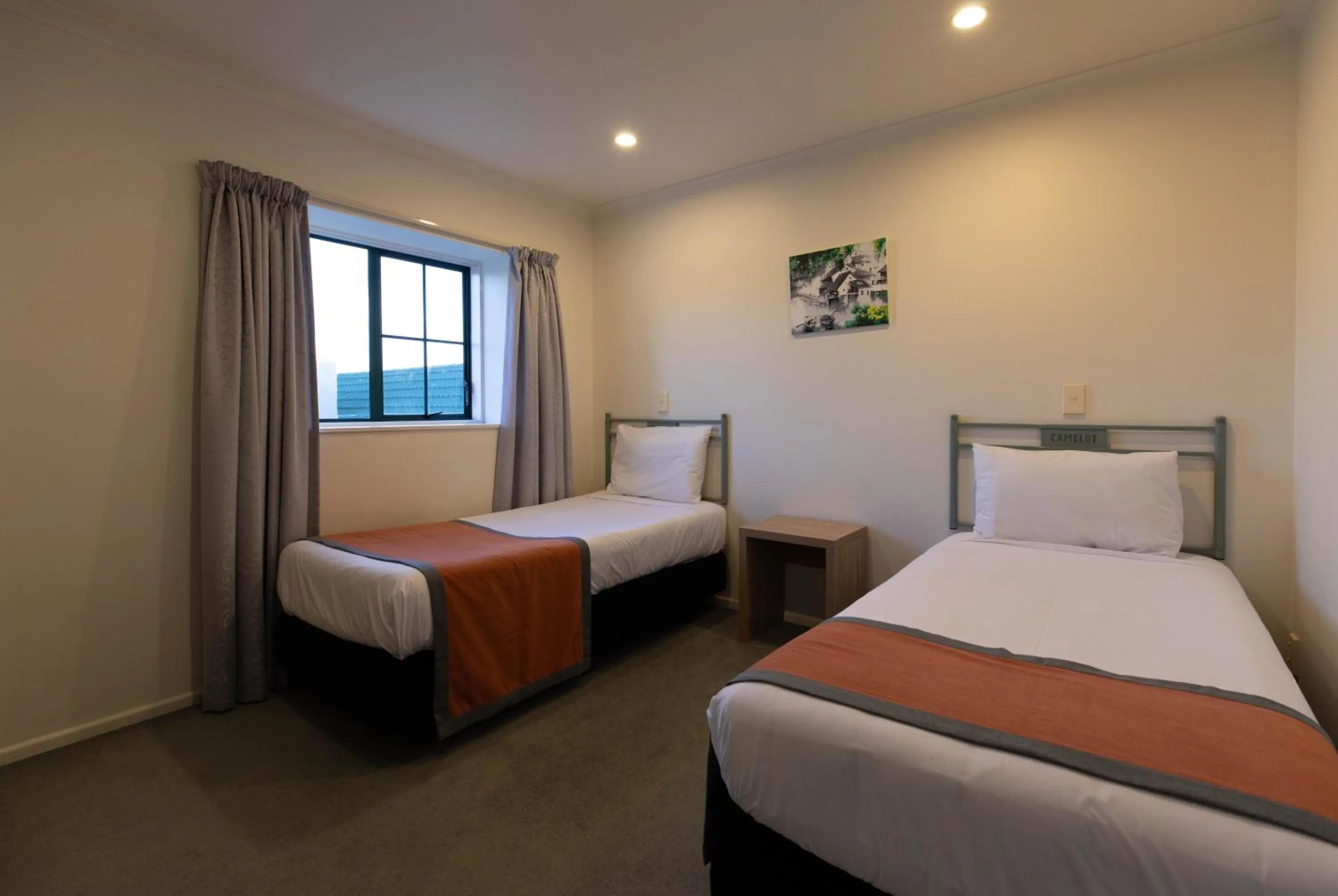 Bedroom, Bed in Camelot Motor Lodge and Conference Centre