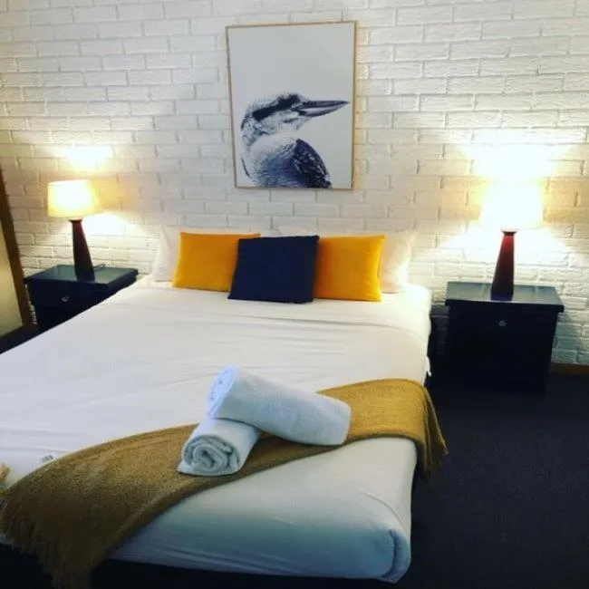 Bed in Montville Holiday Apartments