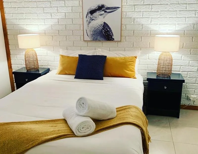 Bed in Montville Holiday Apartments