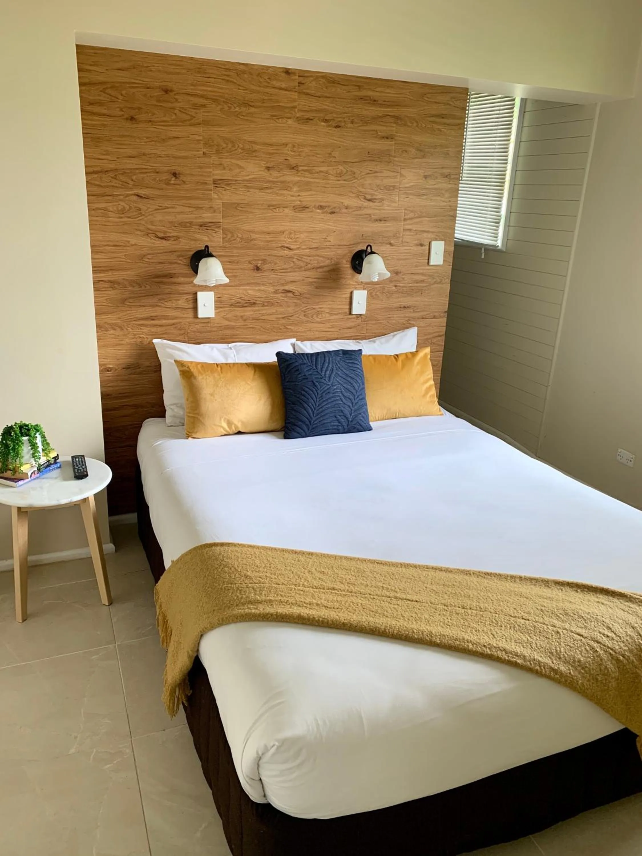 Bed in Montville Holiday Apartments