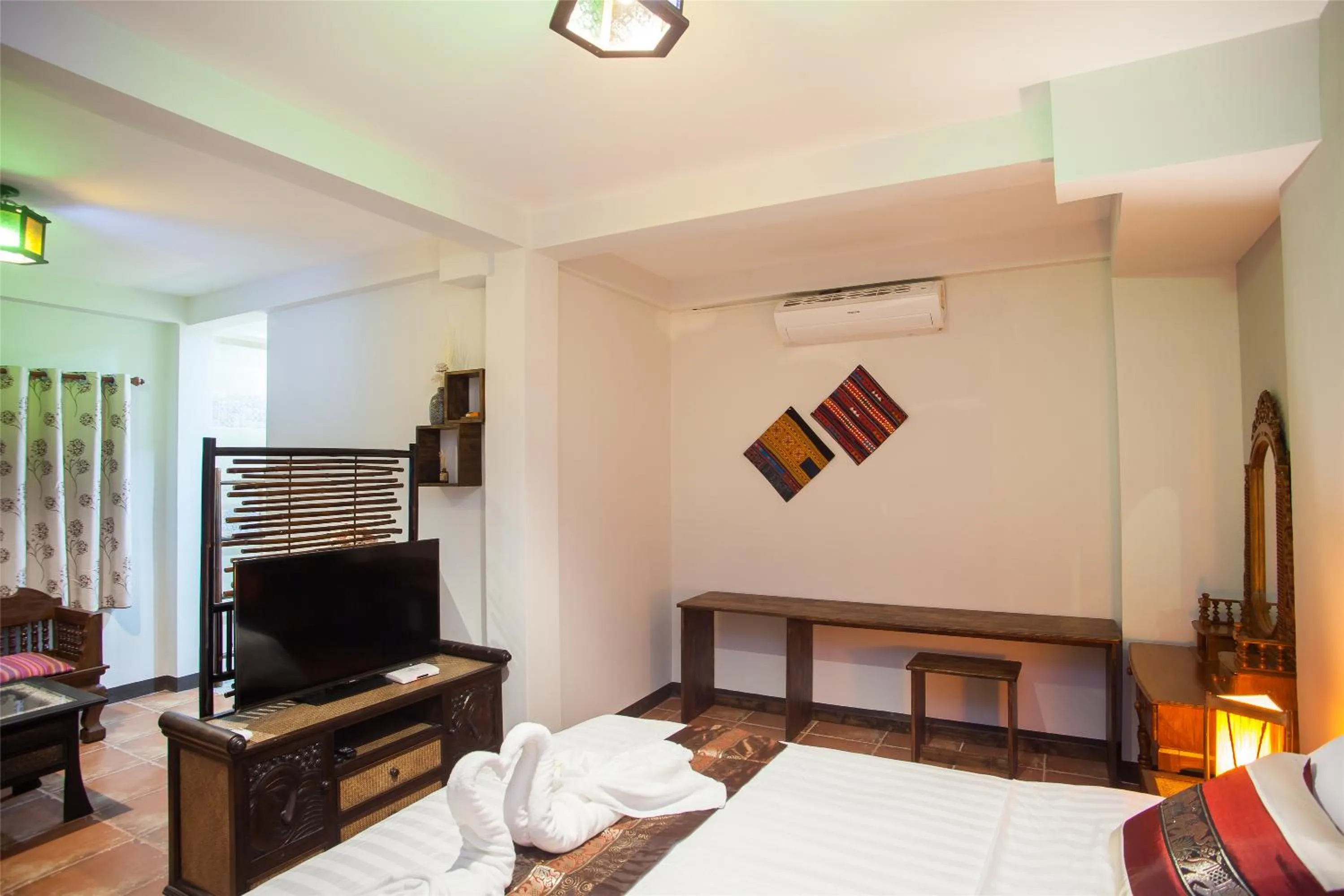 Decorative detail, Bed in Somwang Boutique Hotel