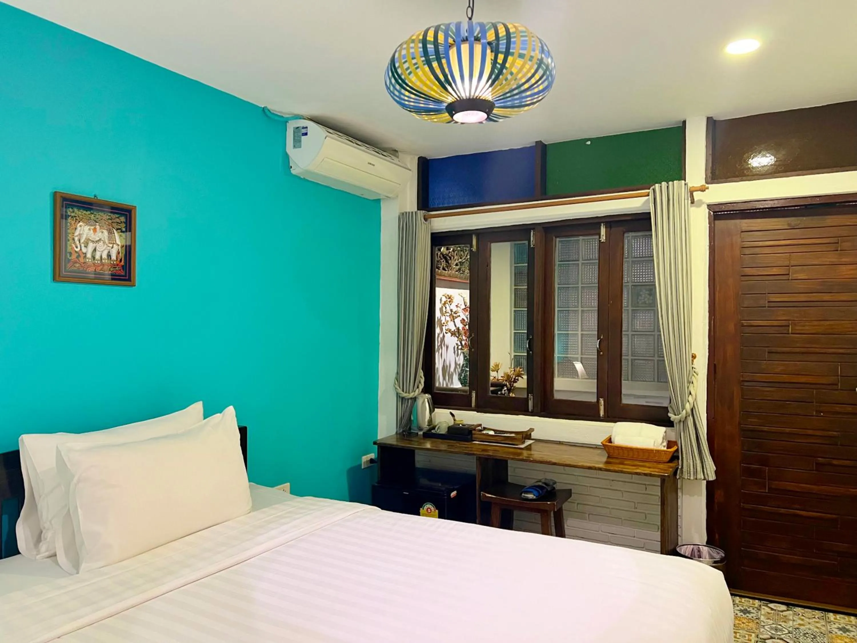 Bed in Somwang Boutique Hotel