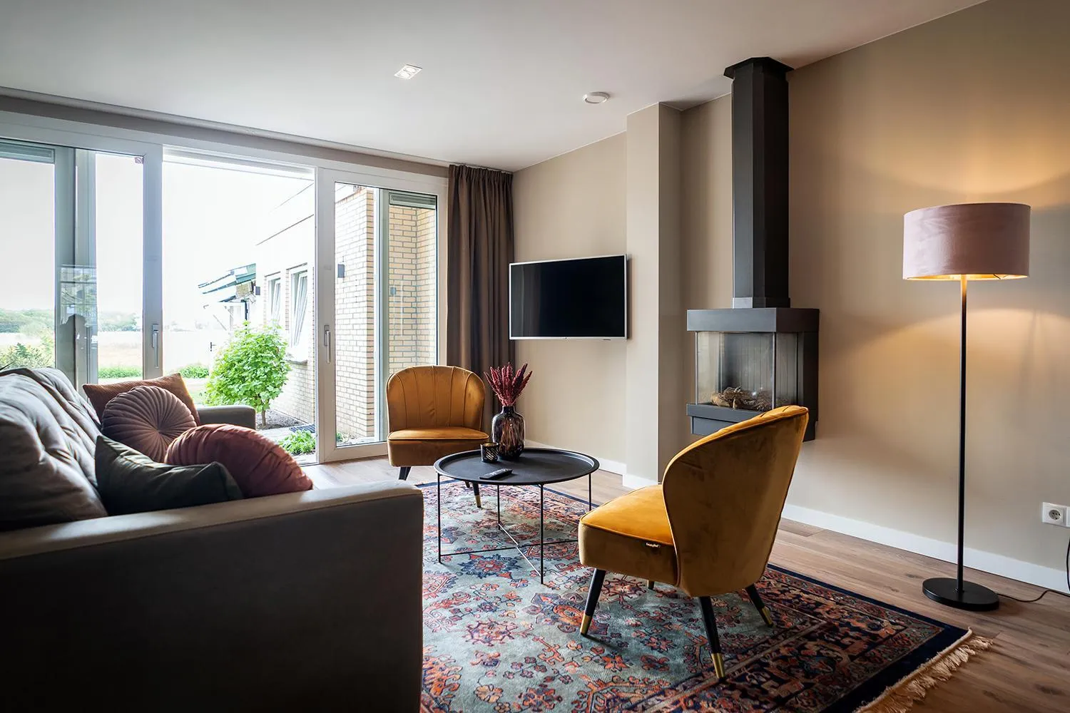 Communal lounge/ TV room in Hotel het Anker van Texel