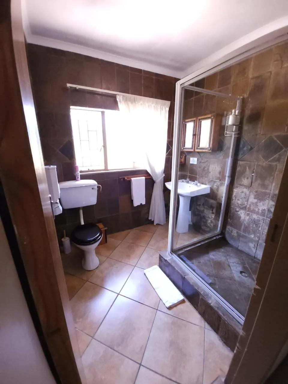 Shower in Rusplek Guesthouse and Conference Centre