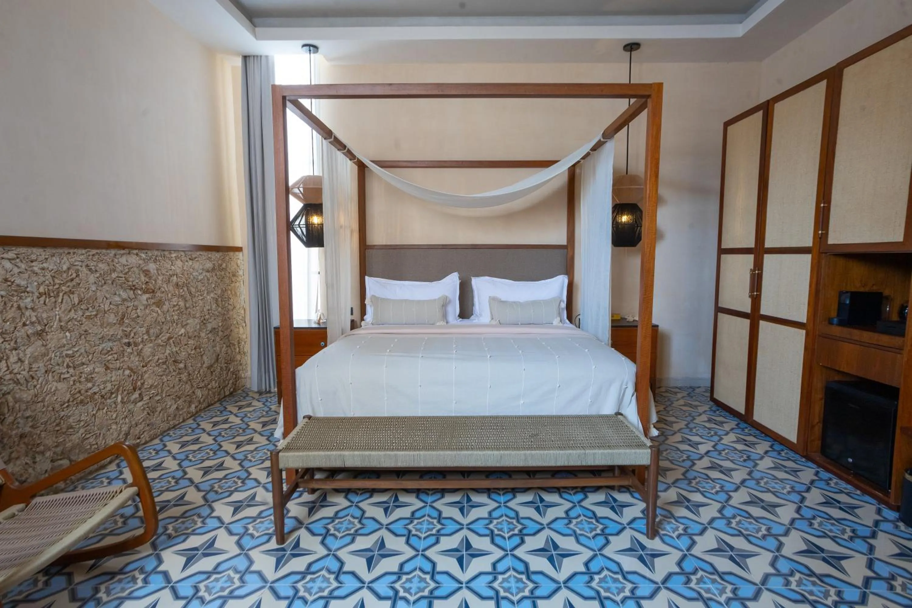 Bed in Adoro Hotel Boutique