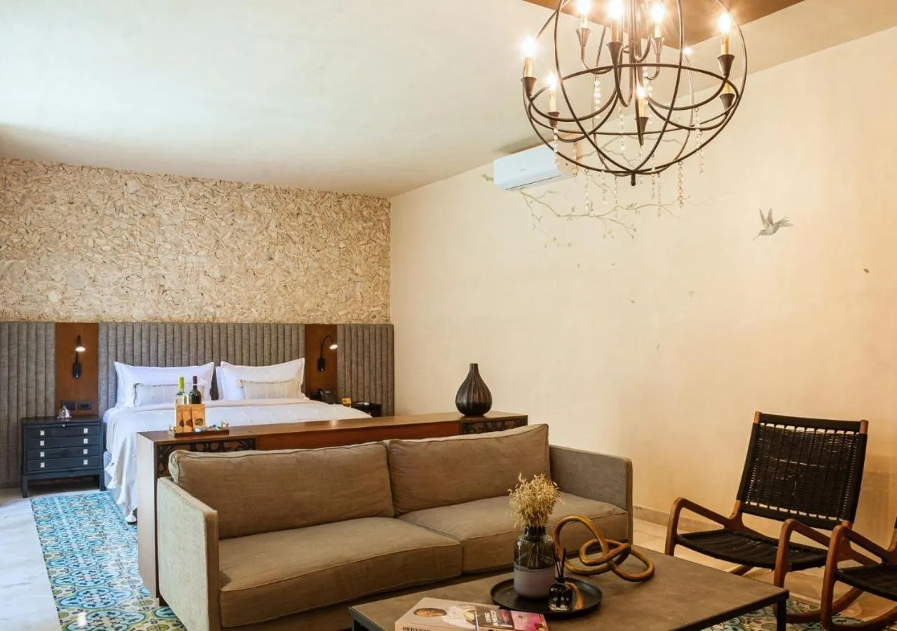 Bed in Adoro Hotel Boutique