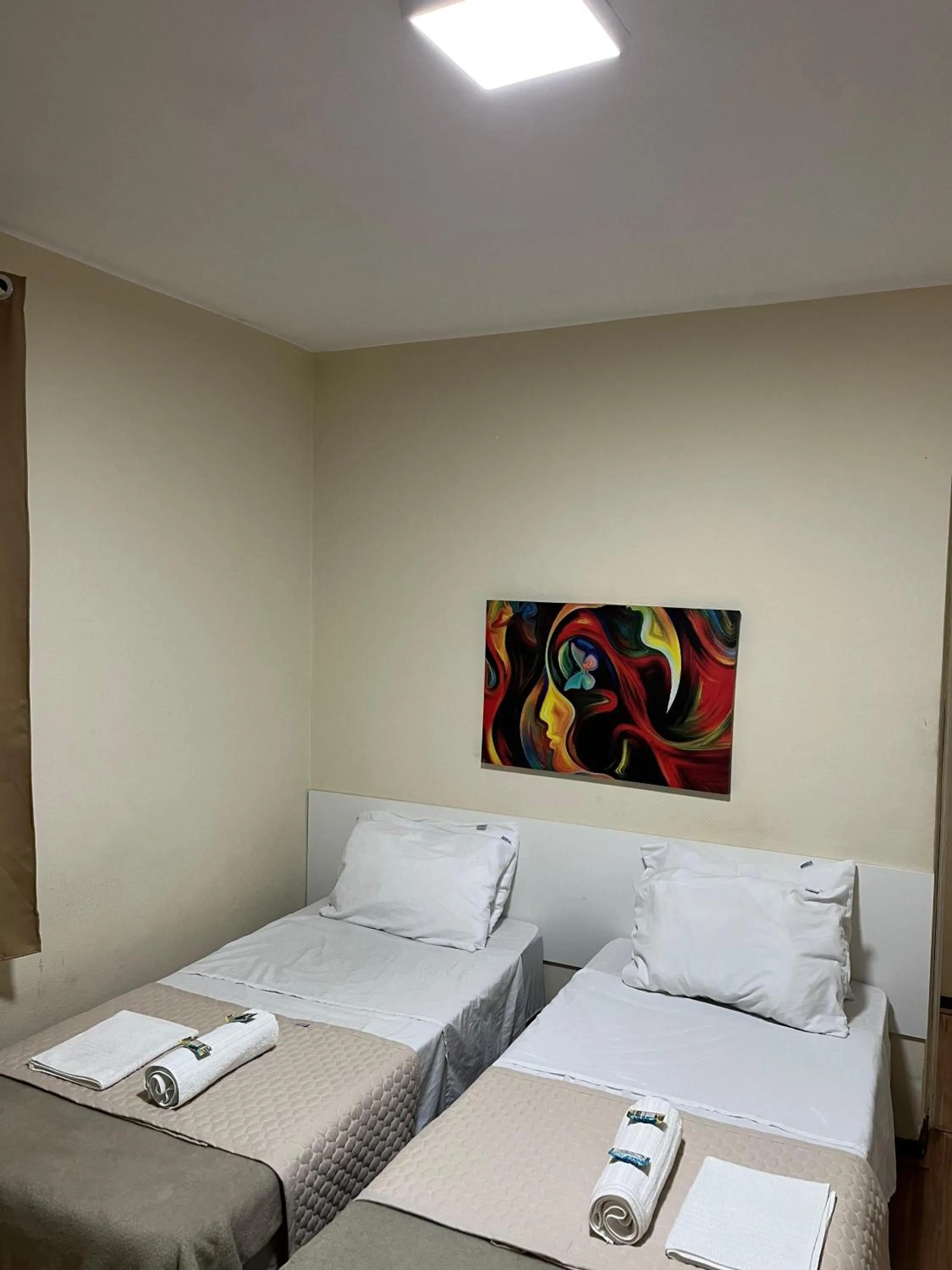 Quadruple Room with Private Bathroom - single occupancy in Hotel Avenida