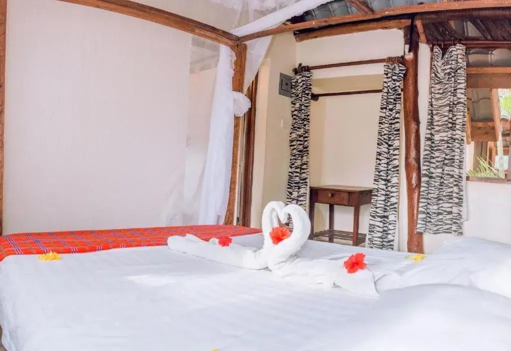Double Room with Private Bathroom - single occupancy in Kijani Cottages Diani Beach Double Room with Private Bathroom - single occupancy in Kijani Cottages Diani Beach