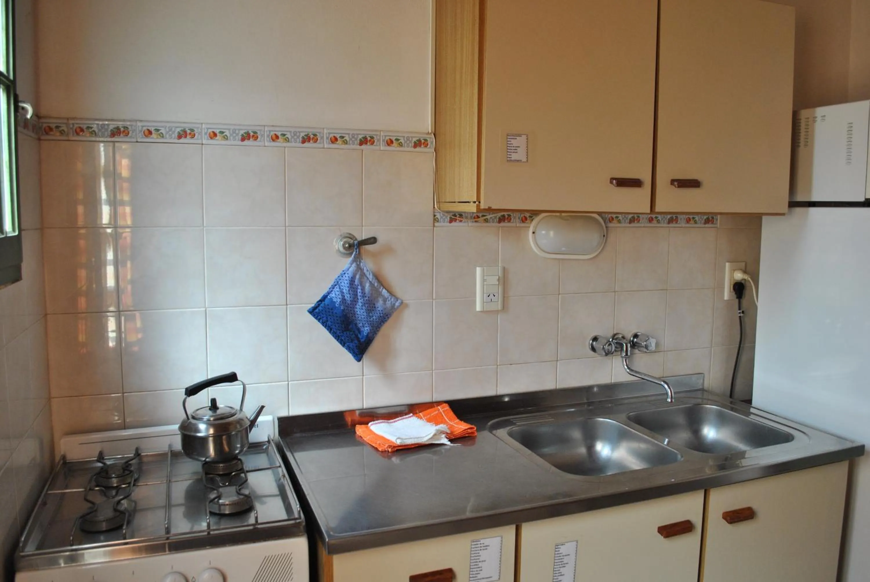 Kitchen or kitchenette in Kume Ruca