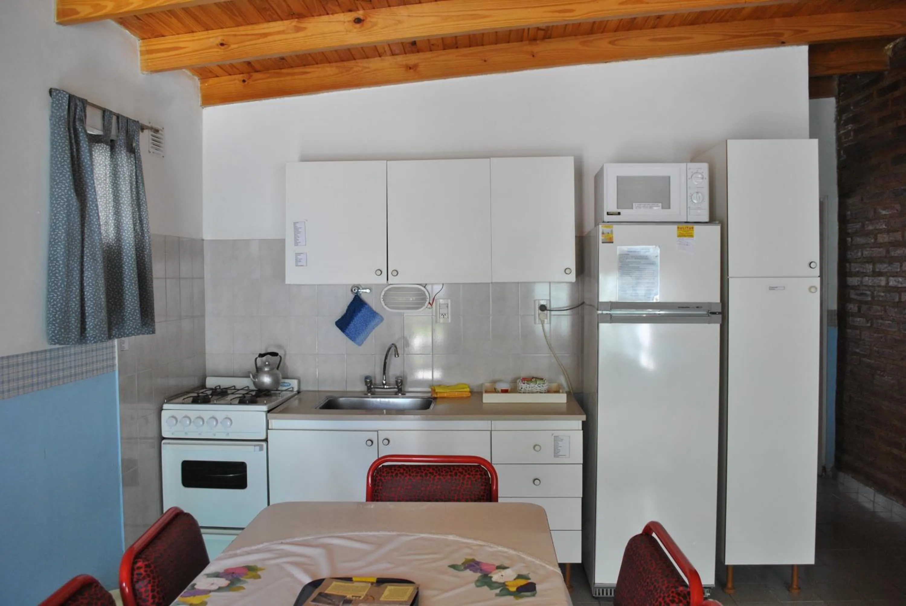 Kitchen or kitchenette in Kume Ruca
