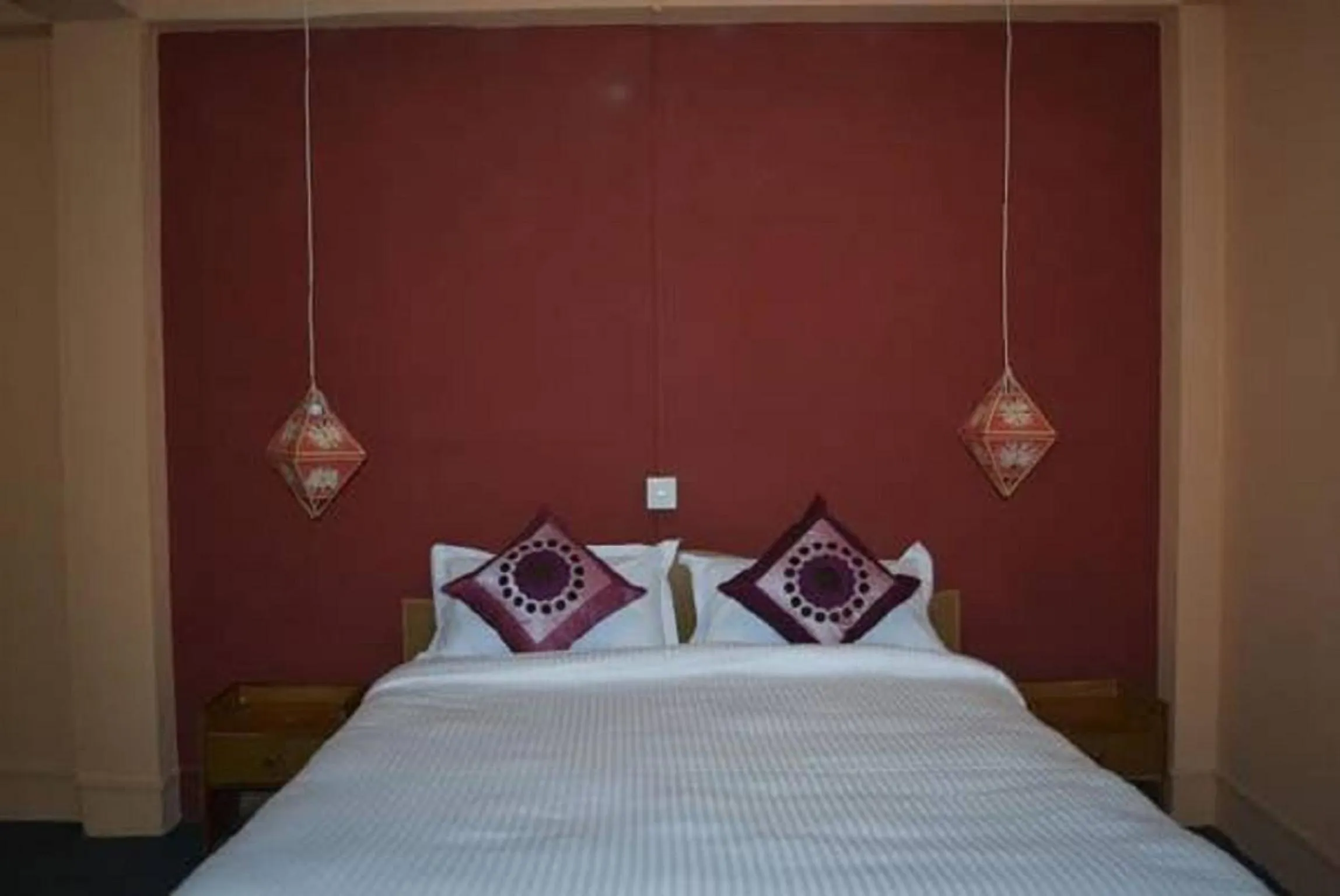 Bed in Bodhi Guest House