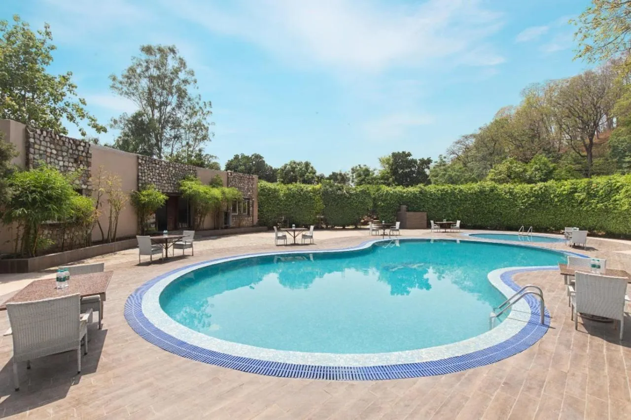 Swimming pool in Click Resort Corbett Tiger Den