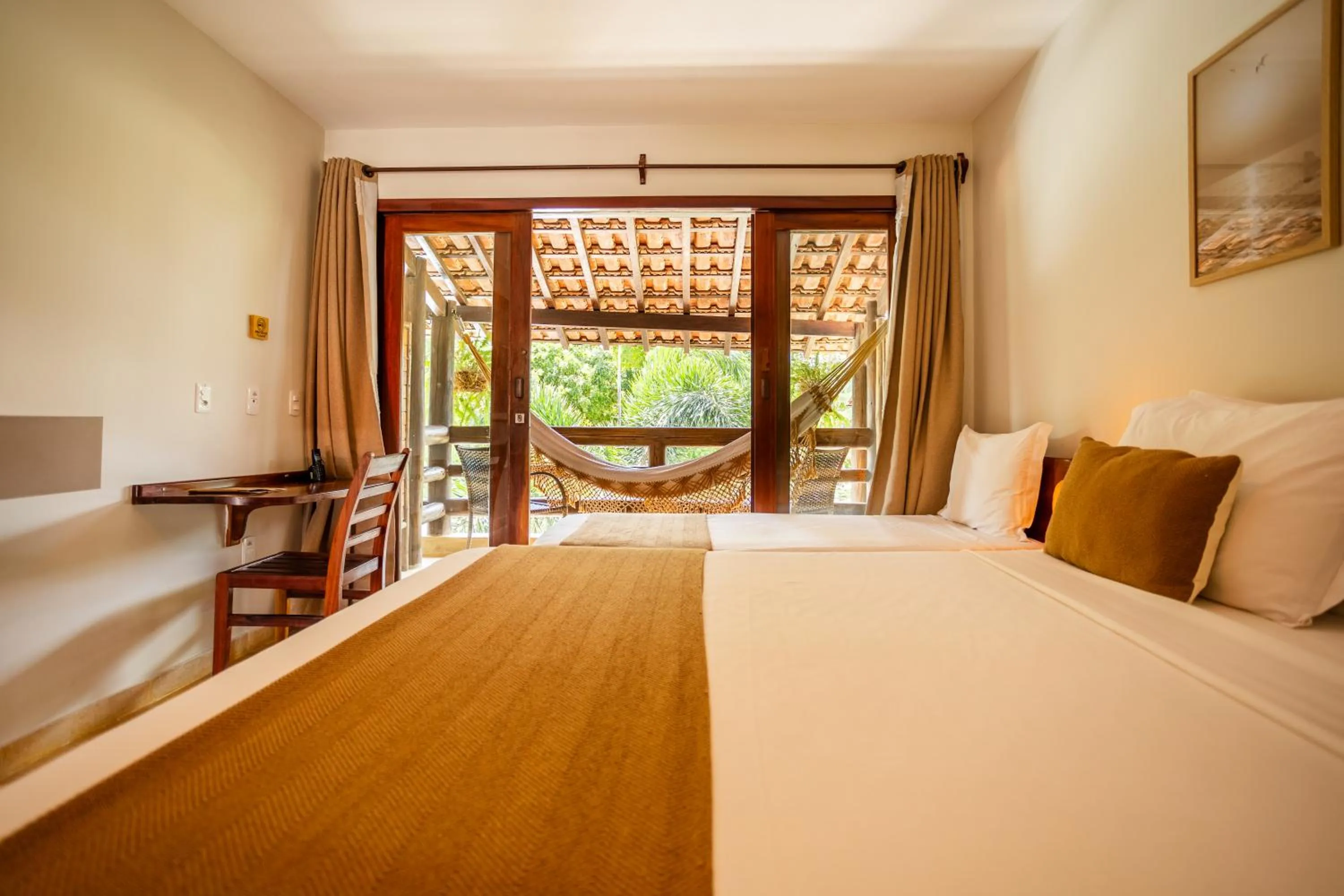 Bed in Pousada Carcará