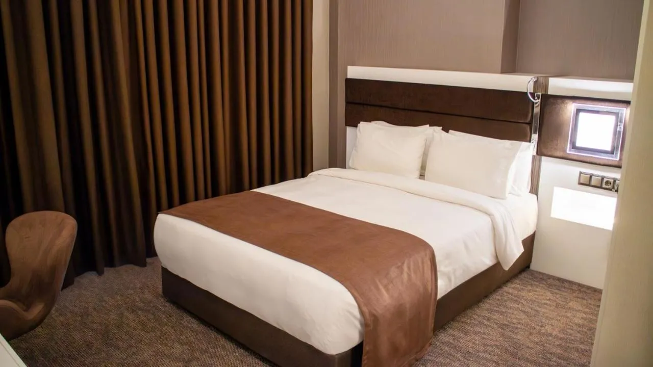 Bed in Sam Royal Hotel