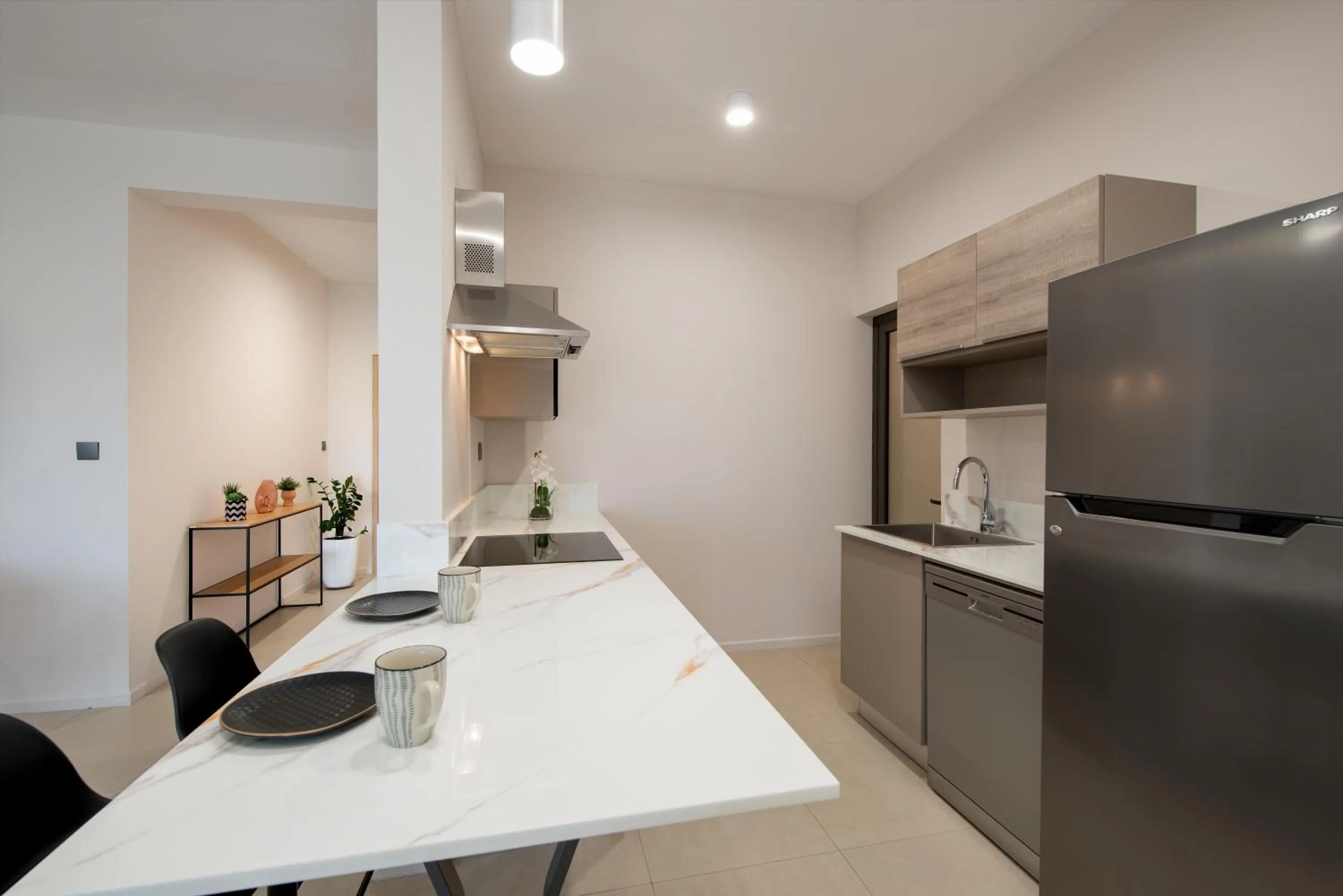 Kitchen or kitchenette in Minissy Suites