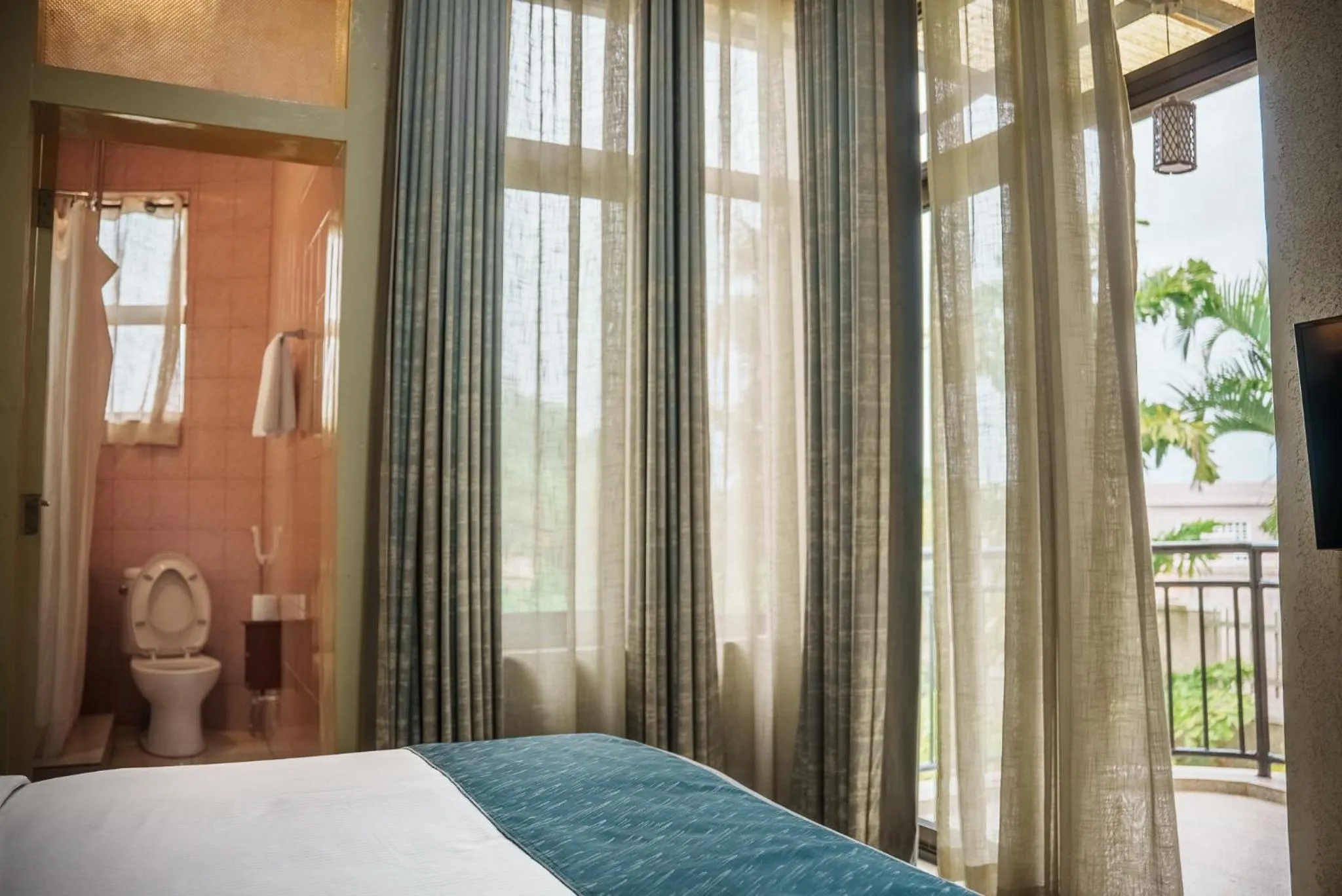 Bed in Quality Inn Hotel Kigali