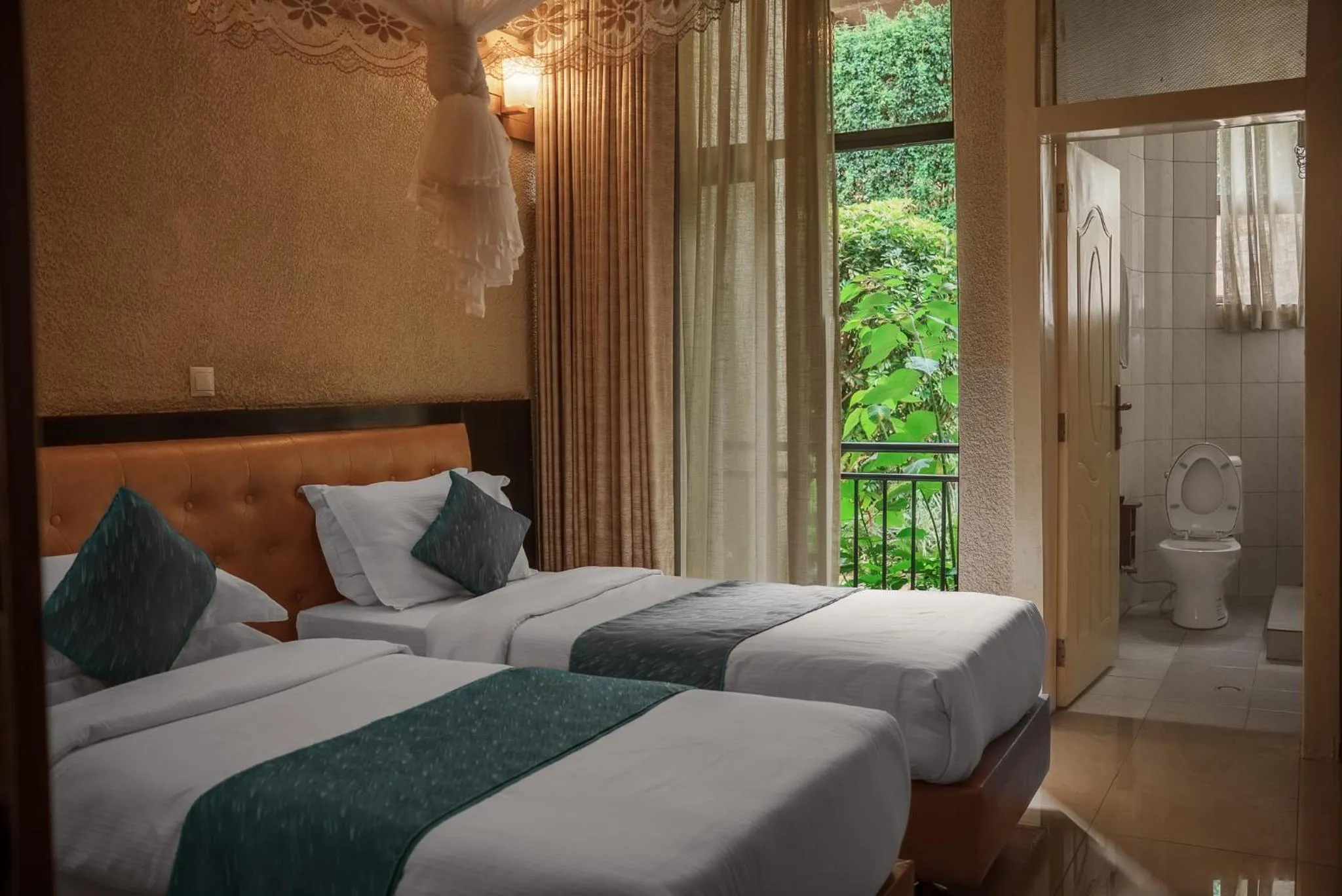 Bed in Quality Inn Hotel Kigali