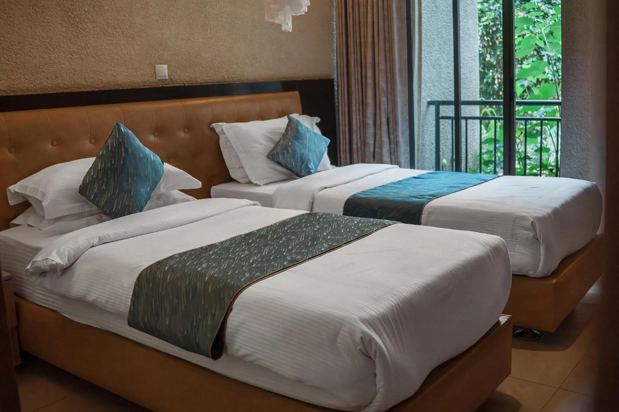 Bed in Quality Inn Hotel Kigali