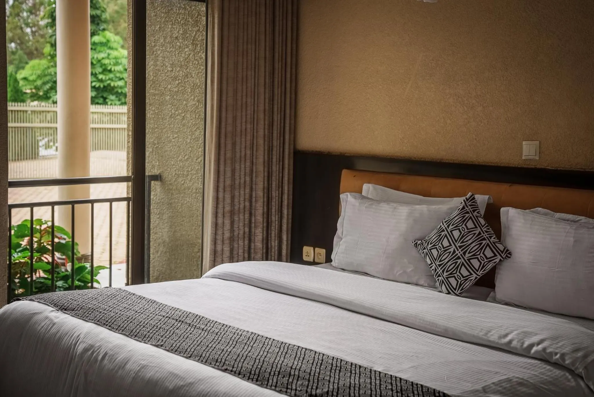 Bed in Quality Inn Hotel Kigali