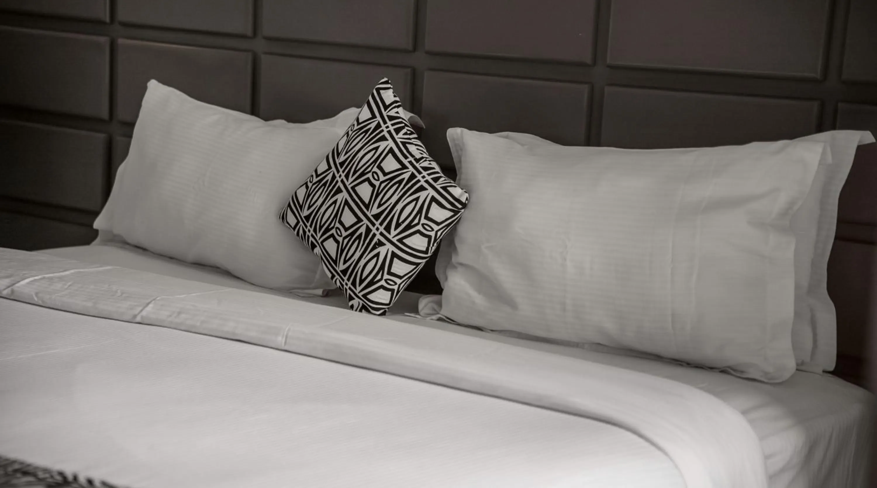 Bed in Quality Inn Hotel Kigali