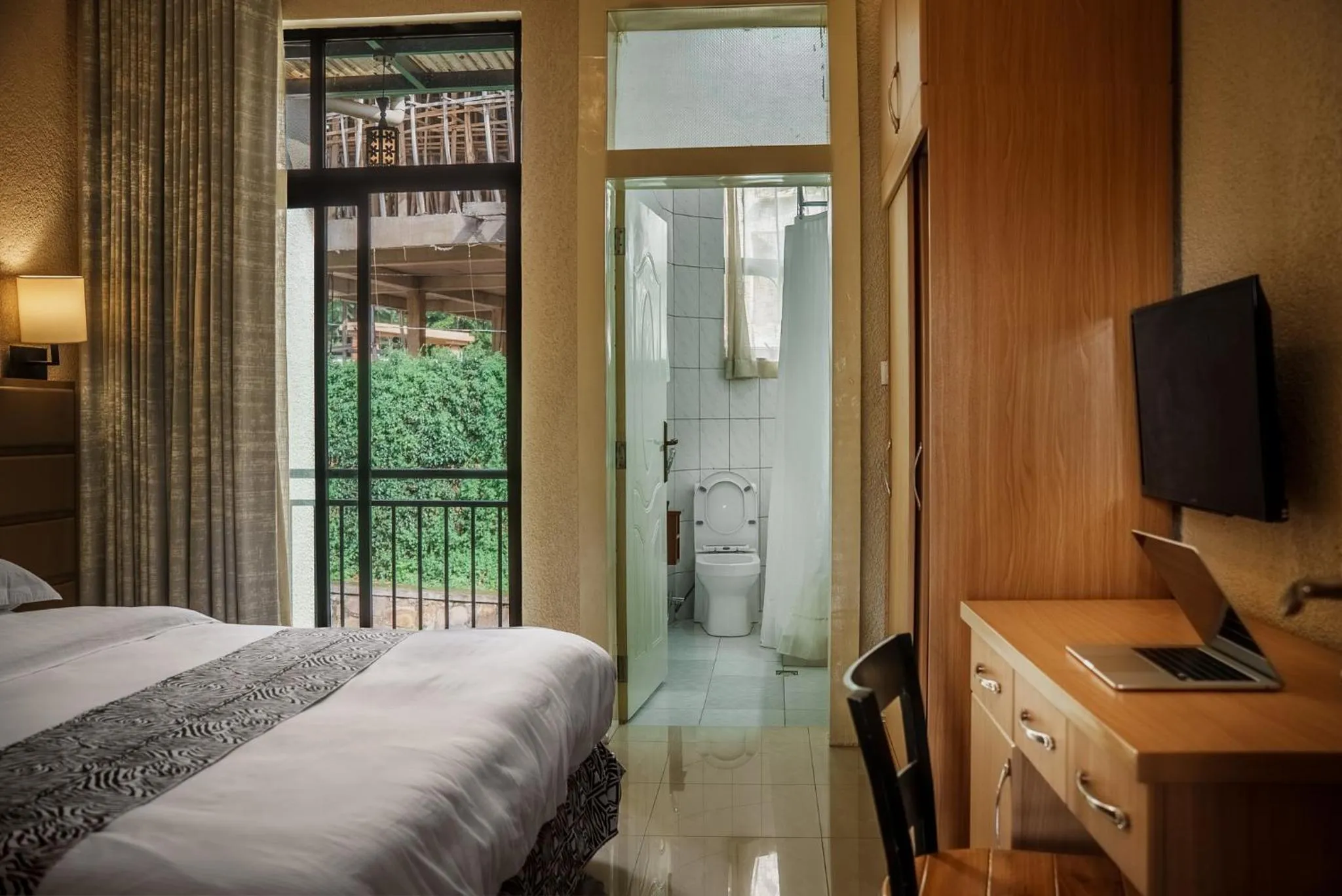 Bed in Quality Inn Hotel Kigali