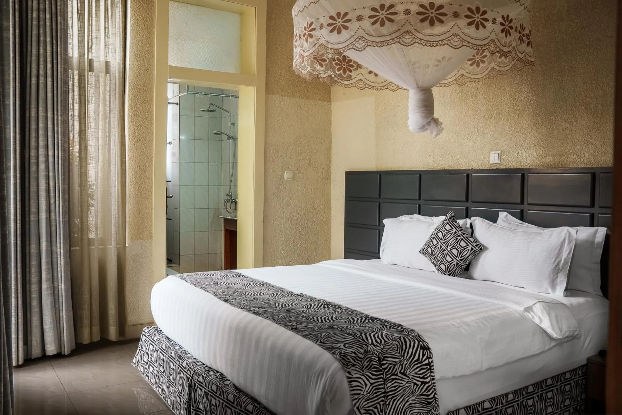 Bed in Quality Inn Hotel Kigali