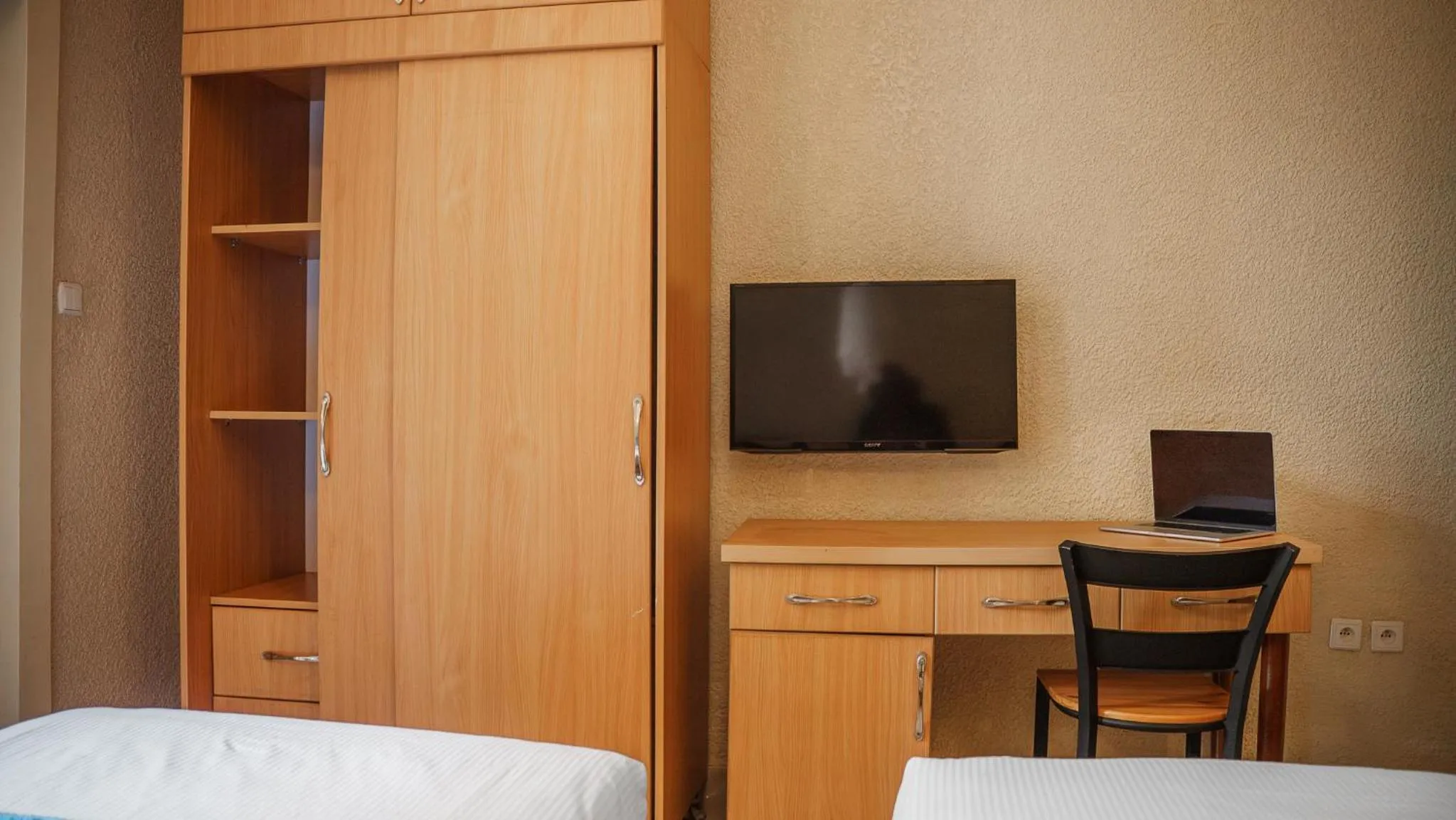 TV and multimedia, Bed in Quality Inn Hotel Kigali